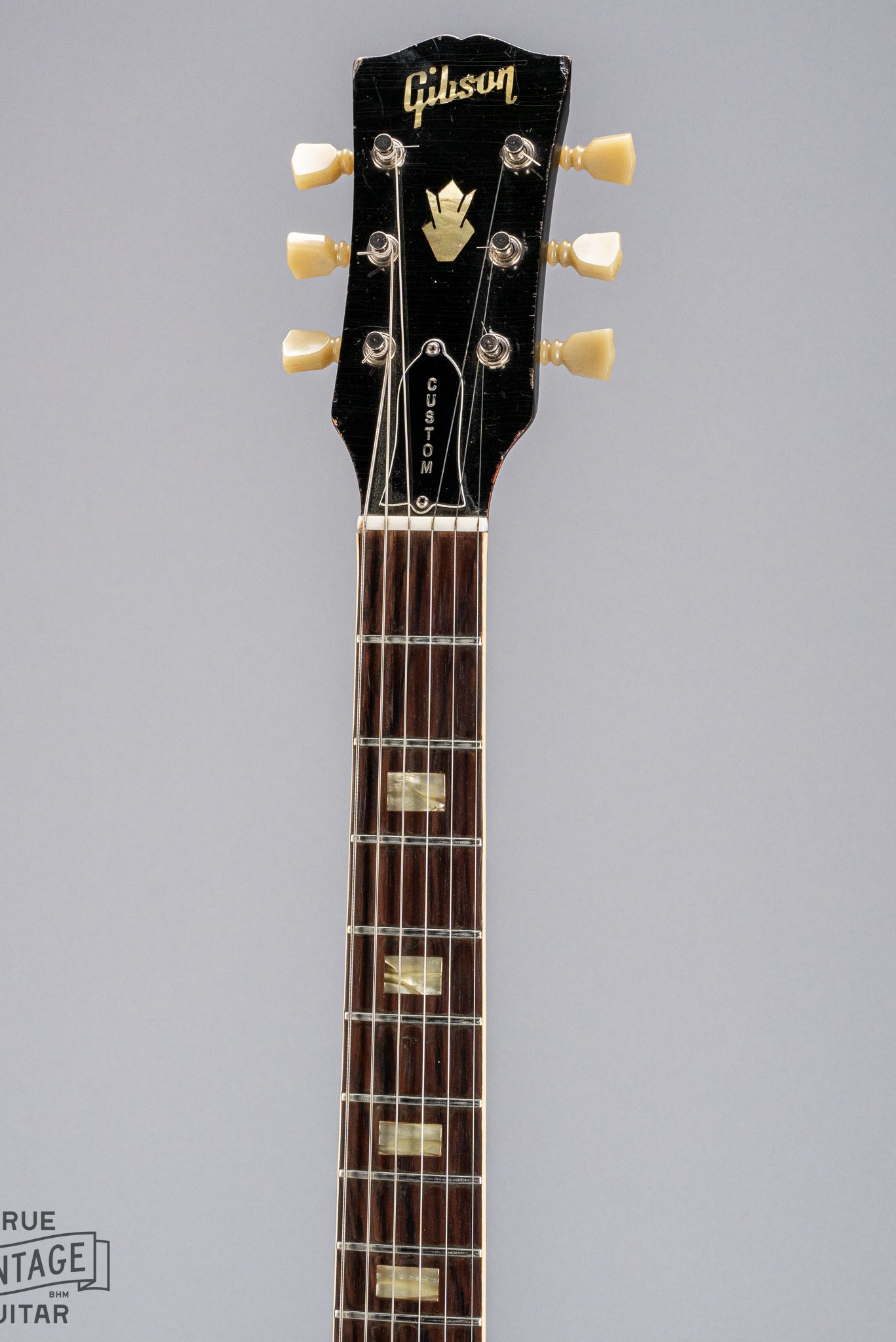 front of Gibson 1963 ES-335 Cherry red guitar neck and headstock