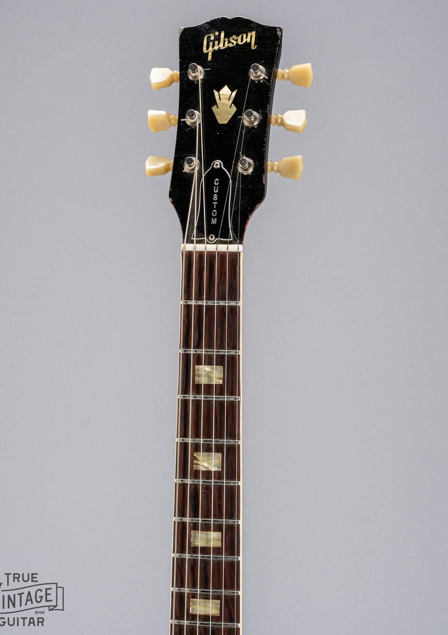 front of Gibson 1963 ES-335 Cherry red guitar neck and headstock