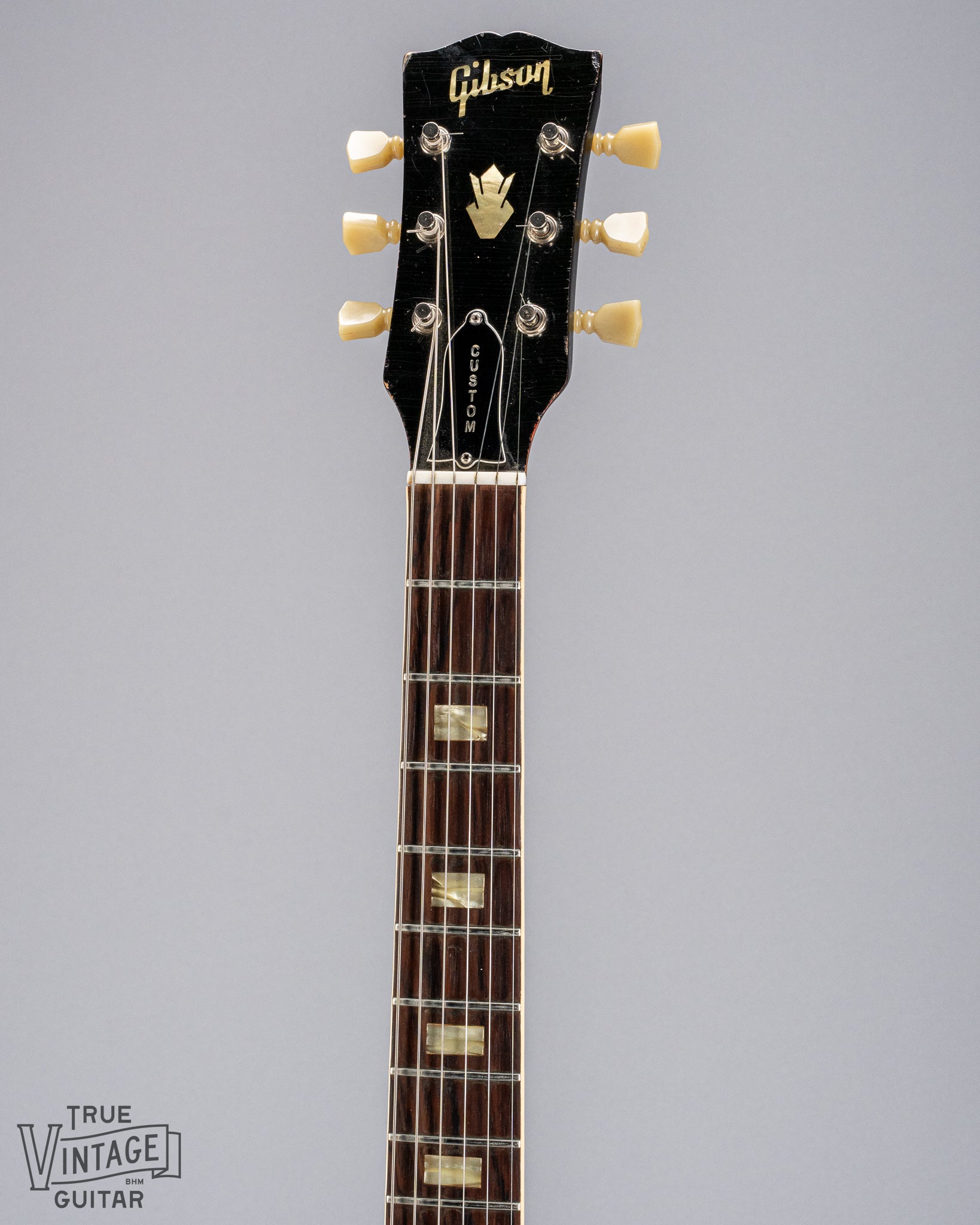 front of Gibson 1963 ES-335 Cherry red guitar neck and headstock