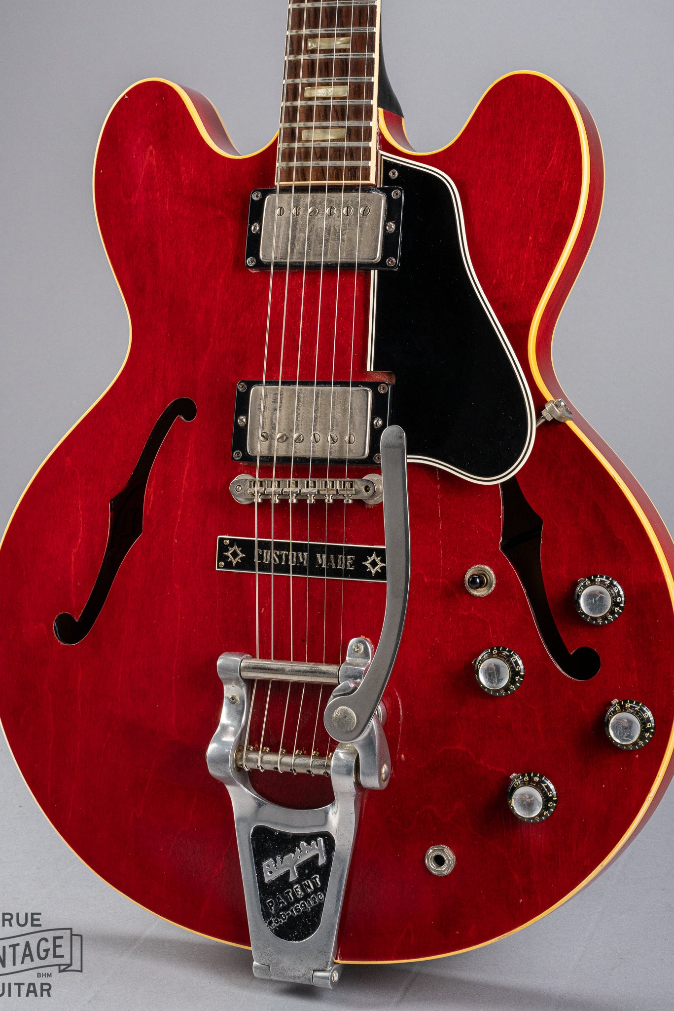 front of Gibson 1963 ES-335 Cherry red guitar body Bigsby