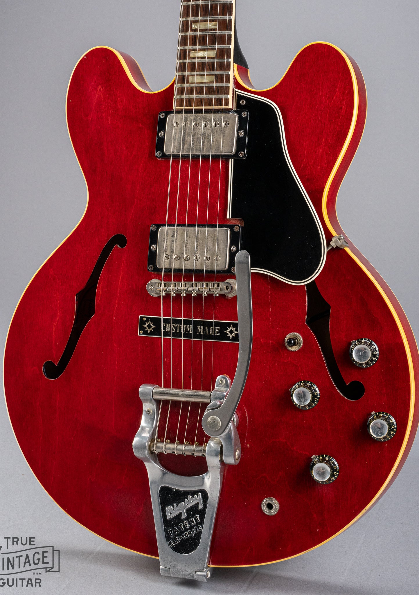 front of Gibson 1963 ES-335 Cherry red guitar body Bigsby