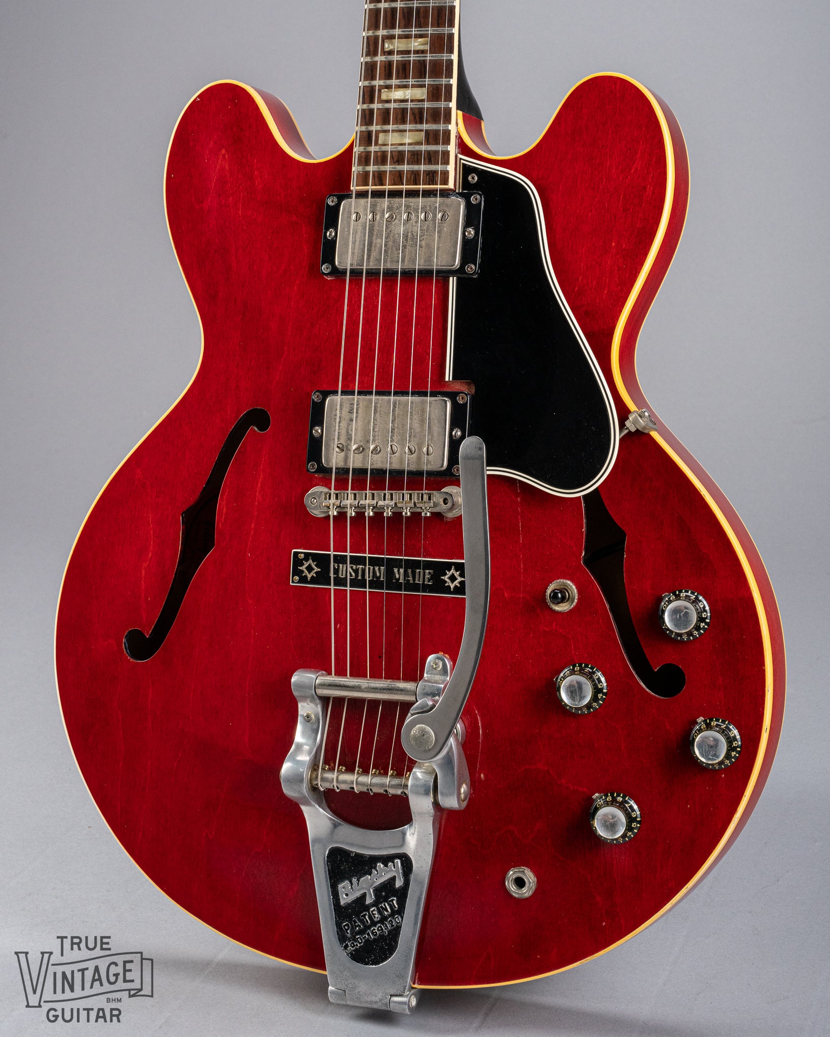 front of Gibson 1963 ES-335 Cherry red guitar body Bigsby