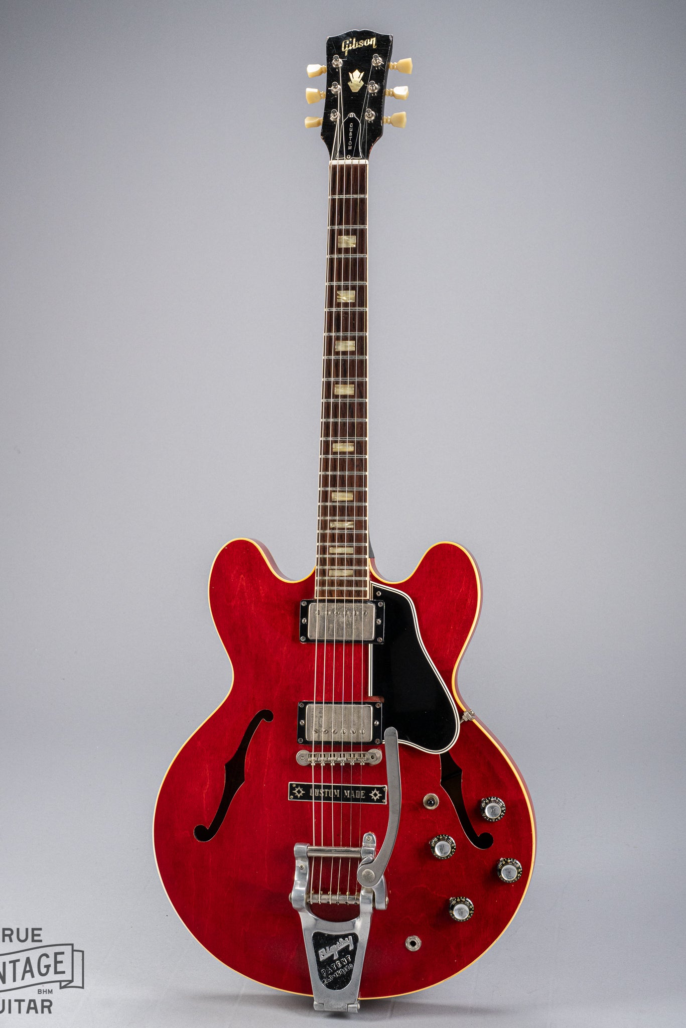 front of Gibson 1963 ES-335 Cherry red guitar body Bigsby neck headstock fretboard
