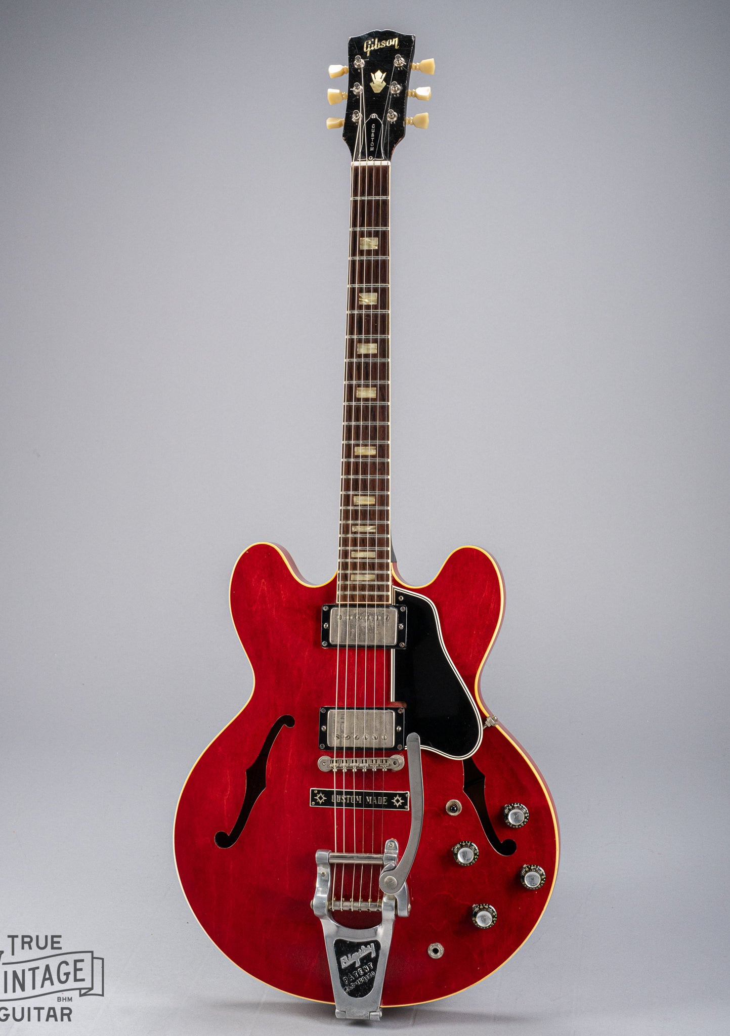 front of Gibson 1963 ES-335 Cherry red guitar body Bigsby neck headstock fretboard