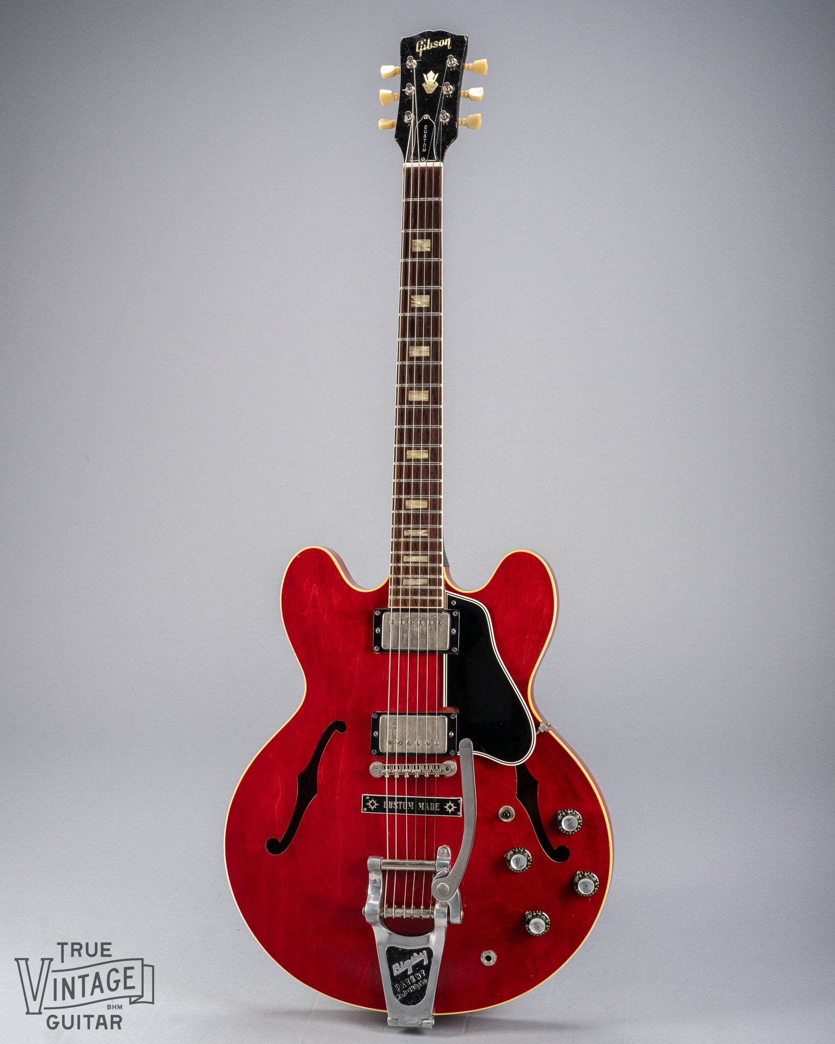 front of Gibson 1963 ES-335 Cherry red guitar body Bigsby neck headstock fretboard