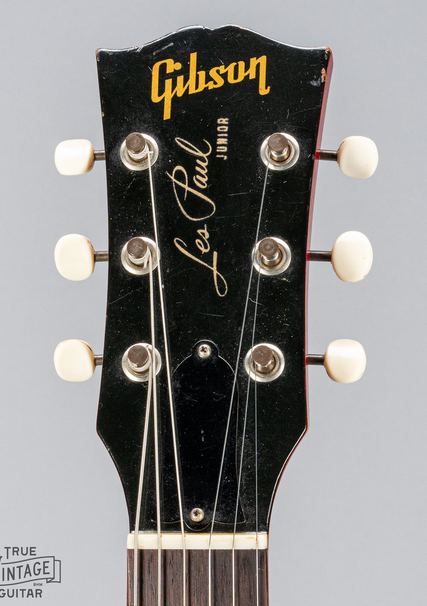 Front of Gibson Les Paul Junior Cherry red guitar headstock tuners nut and Gibson Les Paul Junior logo