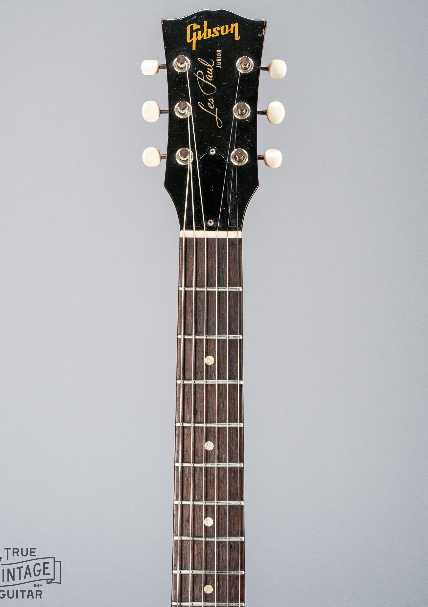 Front of Gibson Les Paul Junior Cherry red guitar neck and headstock