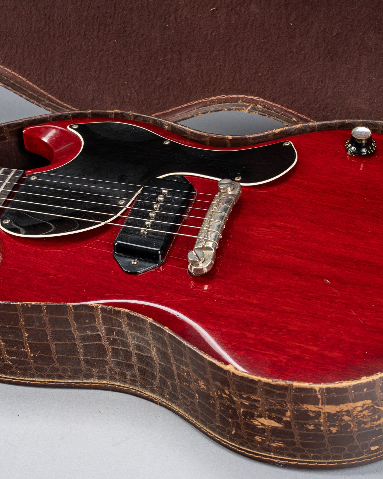 Front of Gibson Les Paul Junior Cherry red guitar body in original case