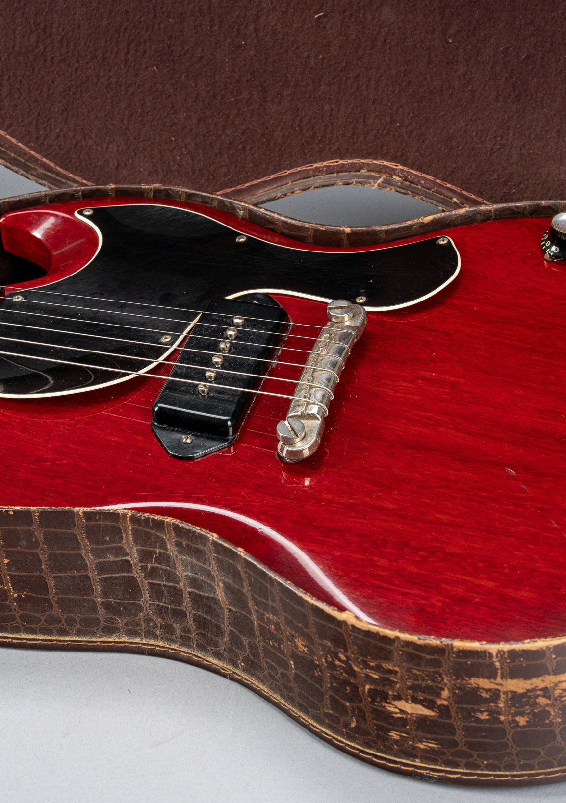 Front of Gibson Les Paul Junior Cherry red guitar body in original case