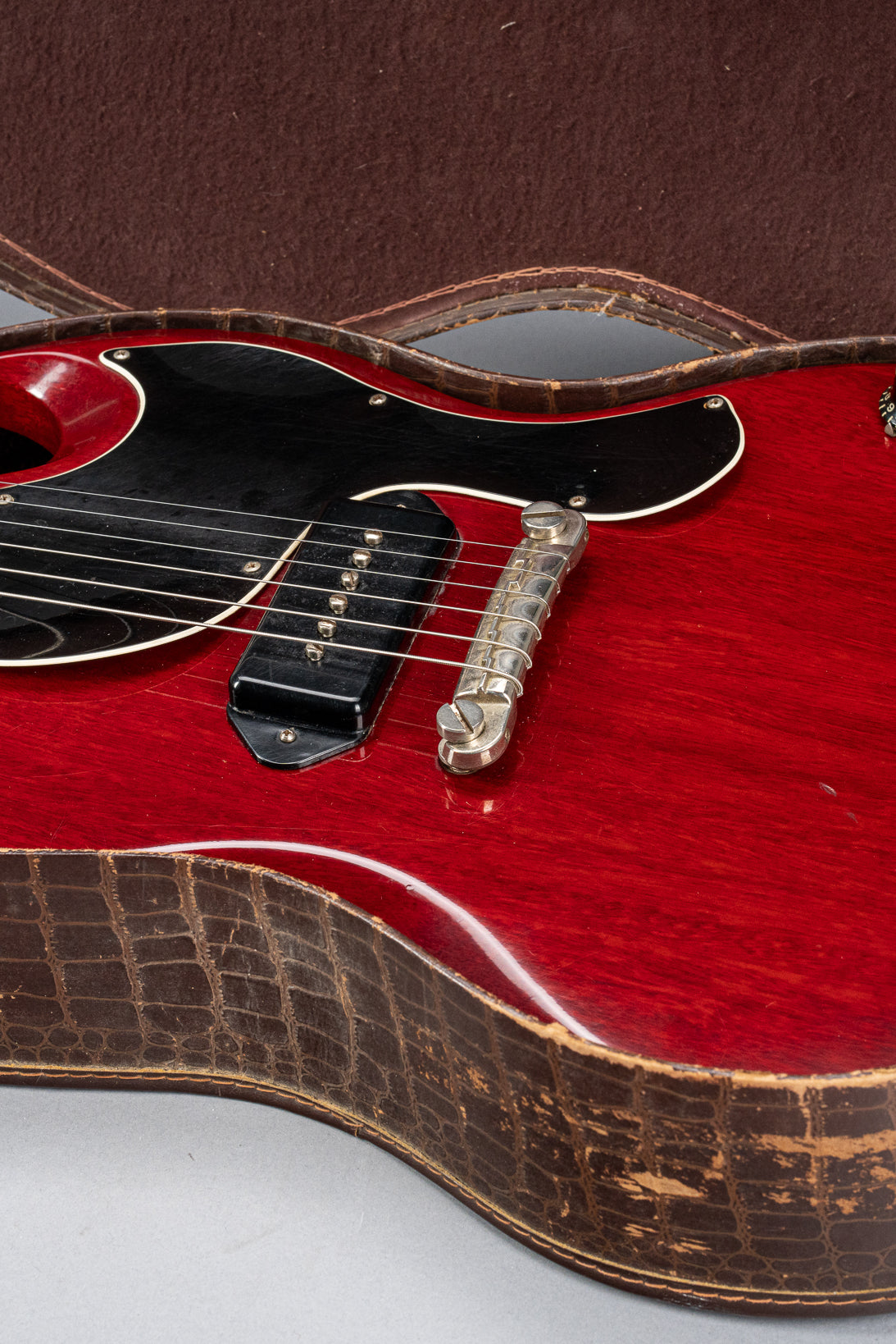 Front of Gibson Les Paul Junior Cherry red guitar body in original case