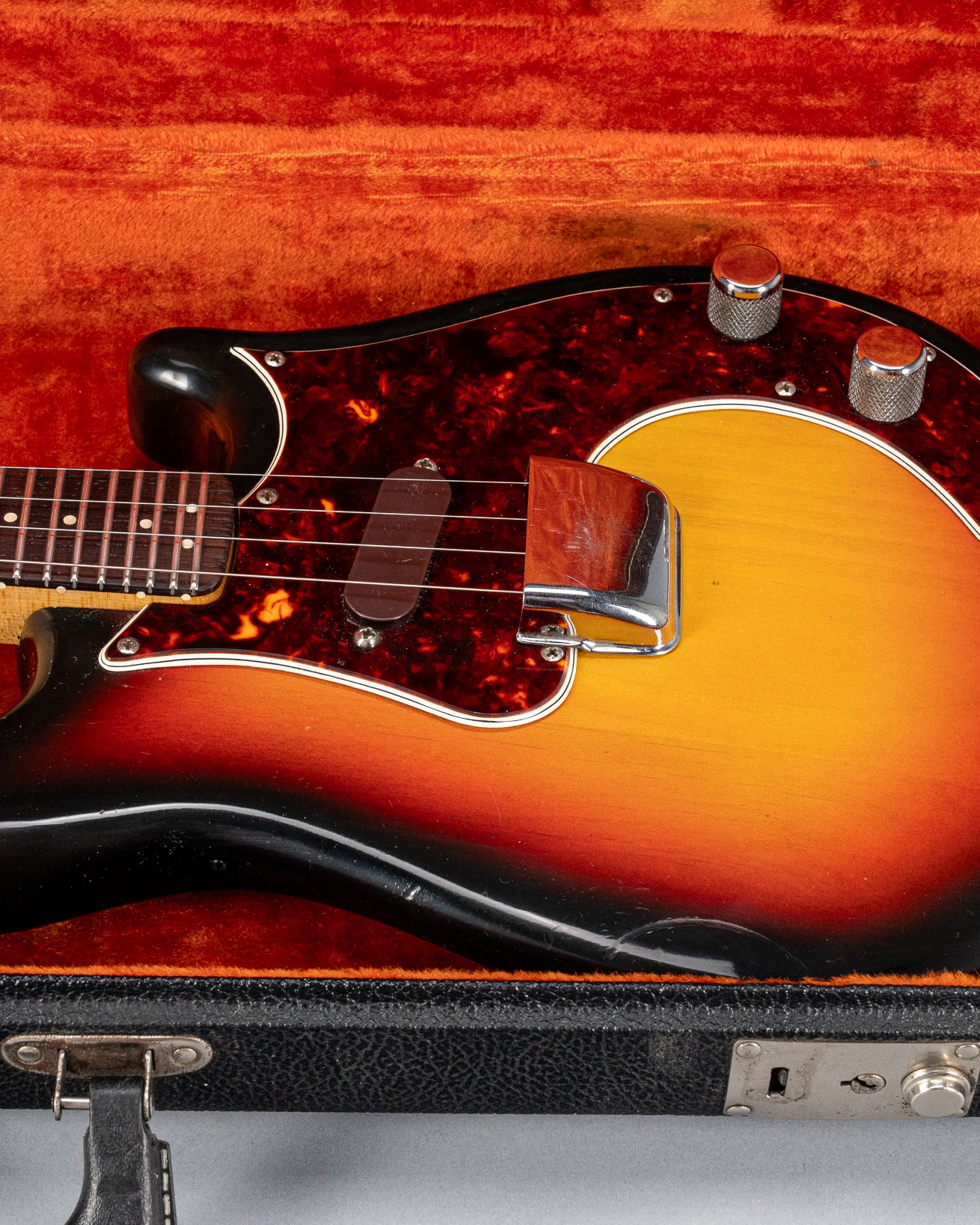 Front of 1965 Fender Electric Mandolin Sunburst guitar mandolin body in original case