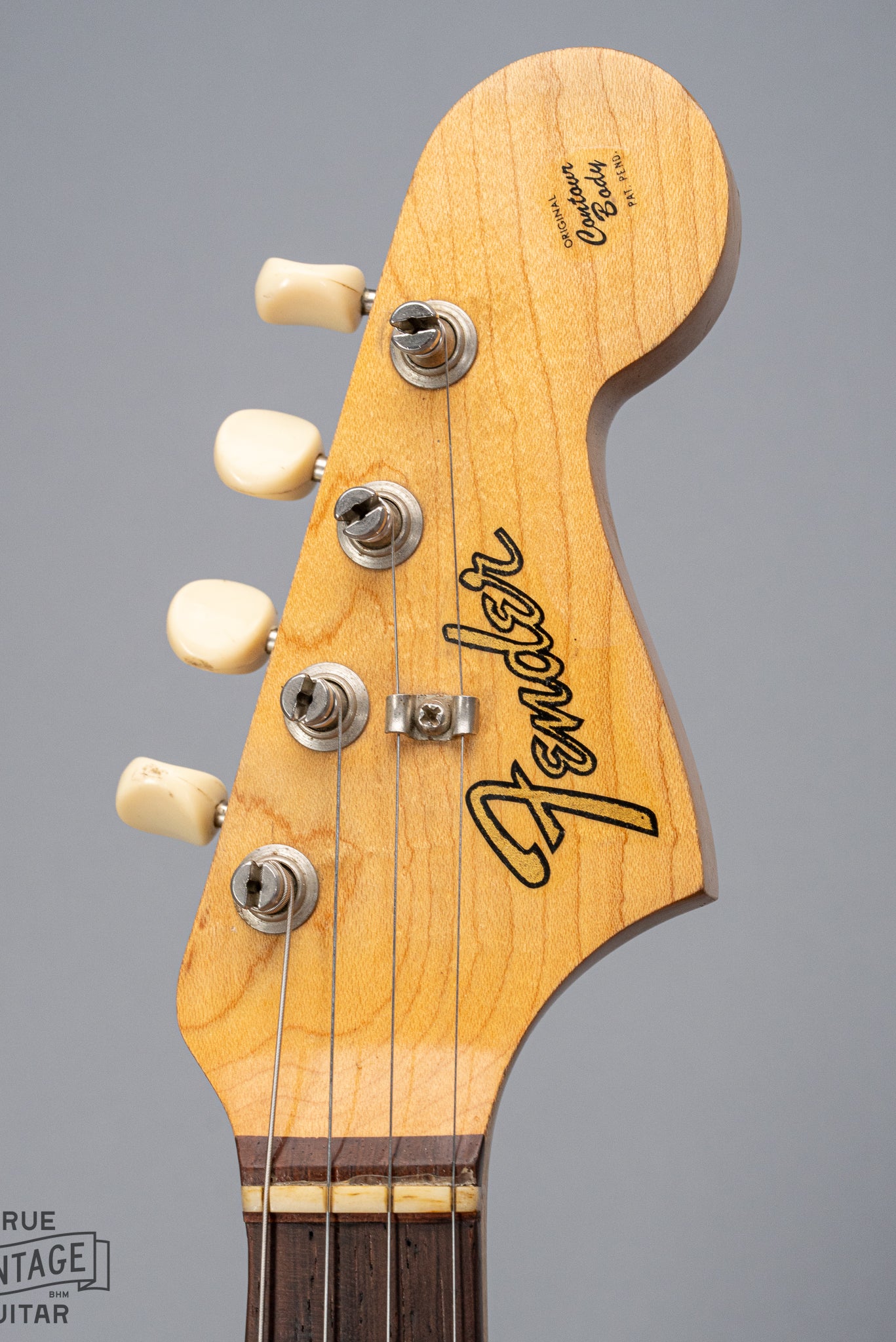 Front of 1965 Fender Electric Mandolin Sunburst guitar mandolin headstock and Fender logo
