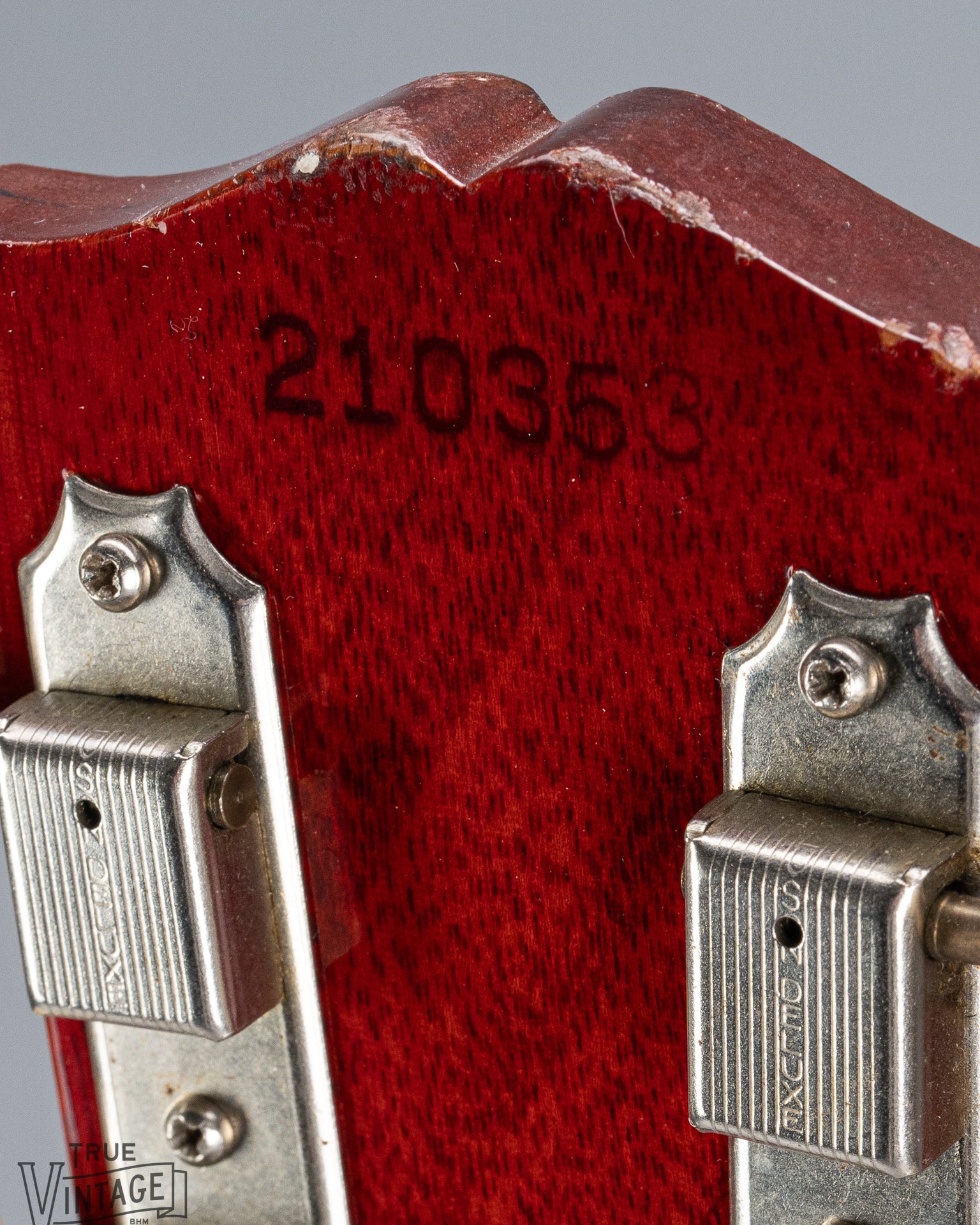 Back of 1964 Gibson SG Junior Cherry guitar neck headstock tuning machines tuner buttons serial number