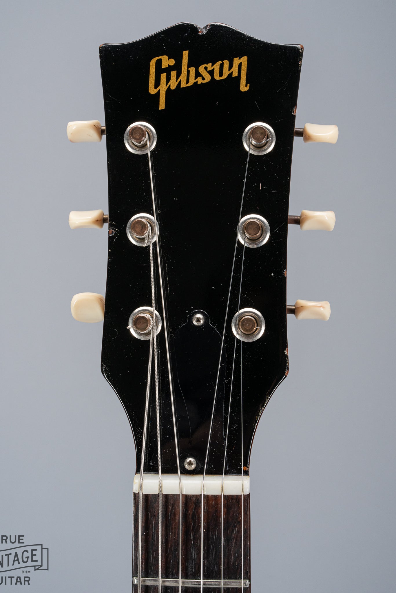 Front of 1964 Gibson SG Junior Cherry guitar neck headstock fretboard original frets tuner buttons Gibson logo nut truss rod cover