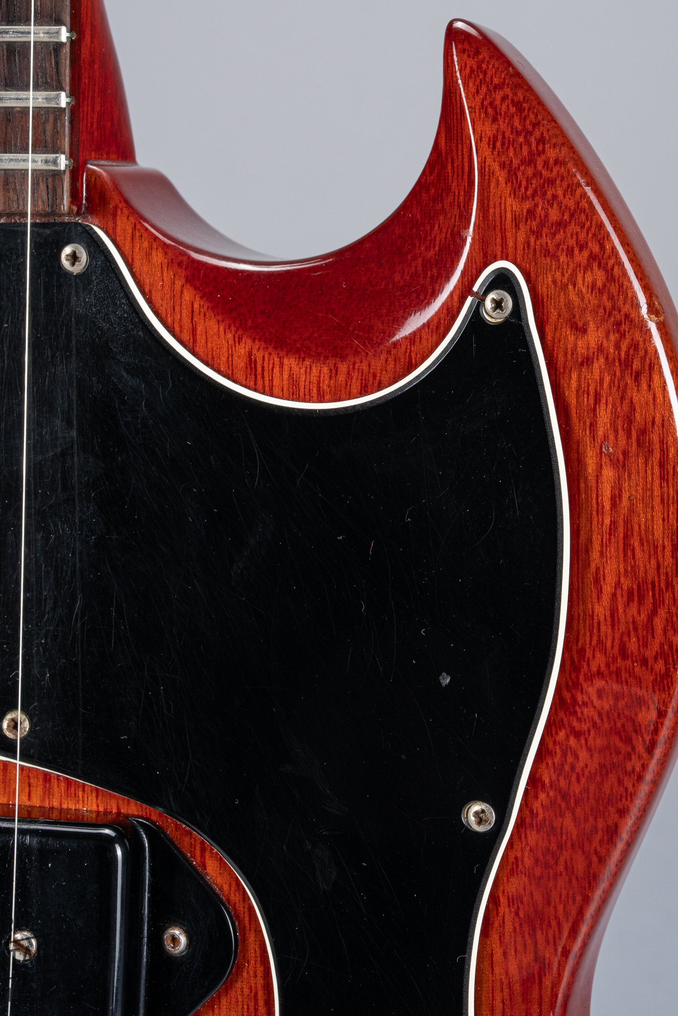 Front of 1964 Gibson SG Junior Cherry body pickguard dog ear P90 horn double cutaway