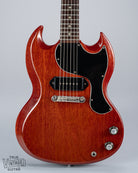 Front of 1964 Gibson SG Junior Cherry guitar body pickguard dog ear P90 bridge wrap around tailpiece volume and tone controls fretboard original frets