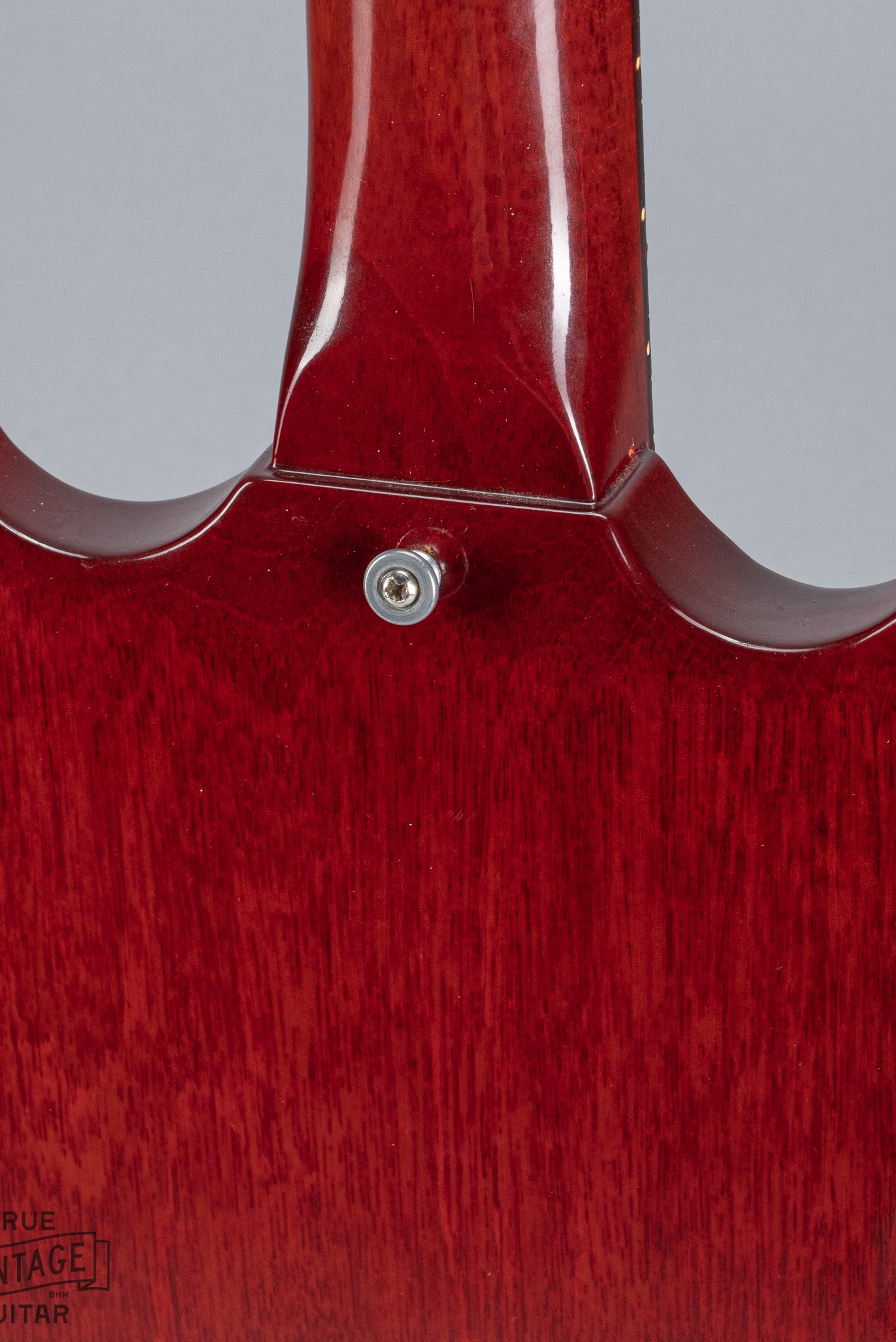 Back of 1964 Gibson SG Junior Cherry guitar body neck heel strap button