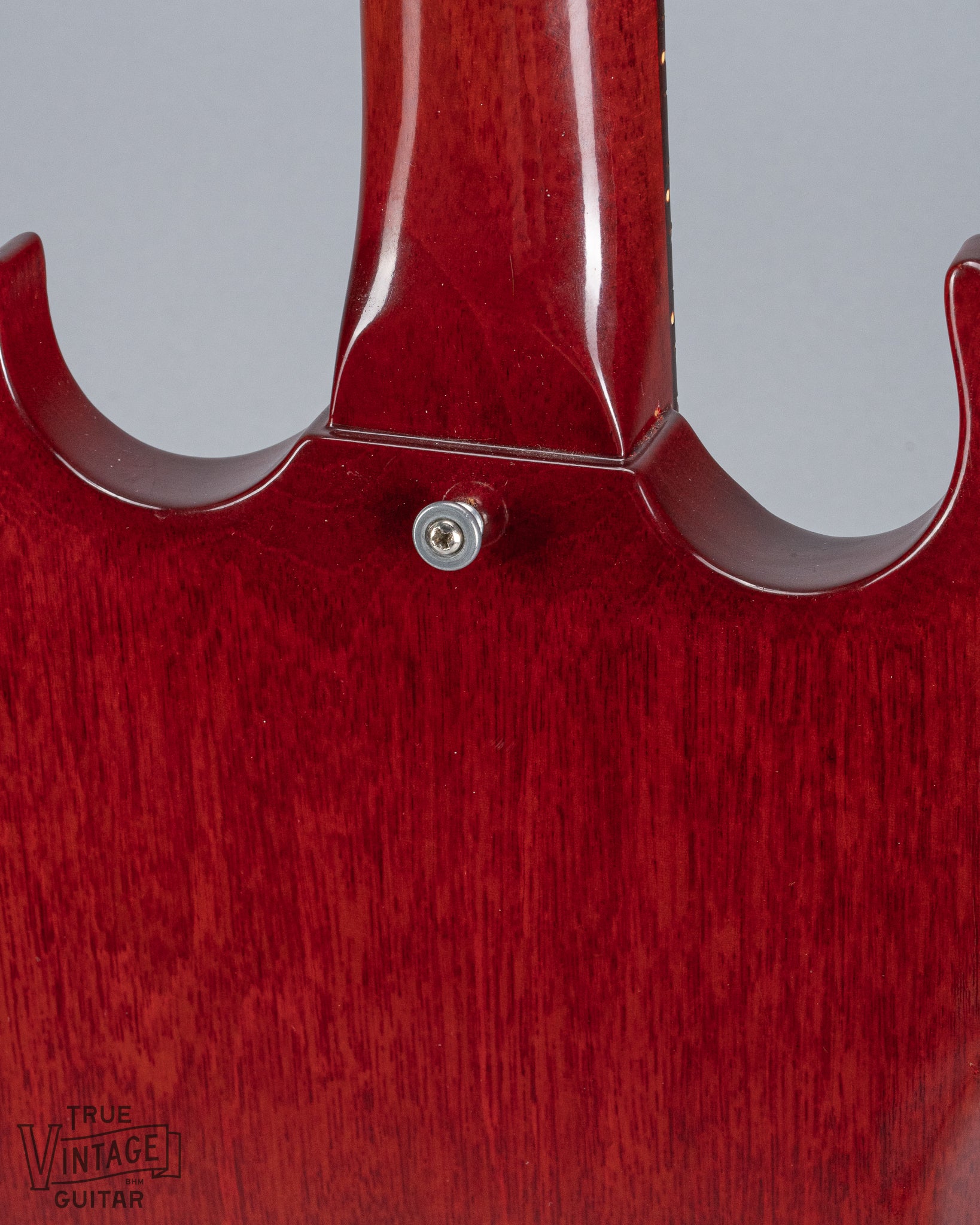 Back of 1964 Gibson SG Junior Cherry guitar body neck heel strap button