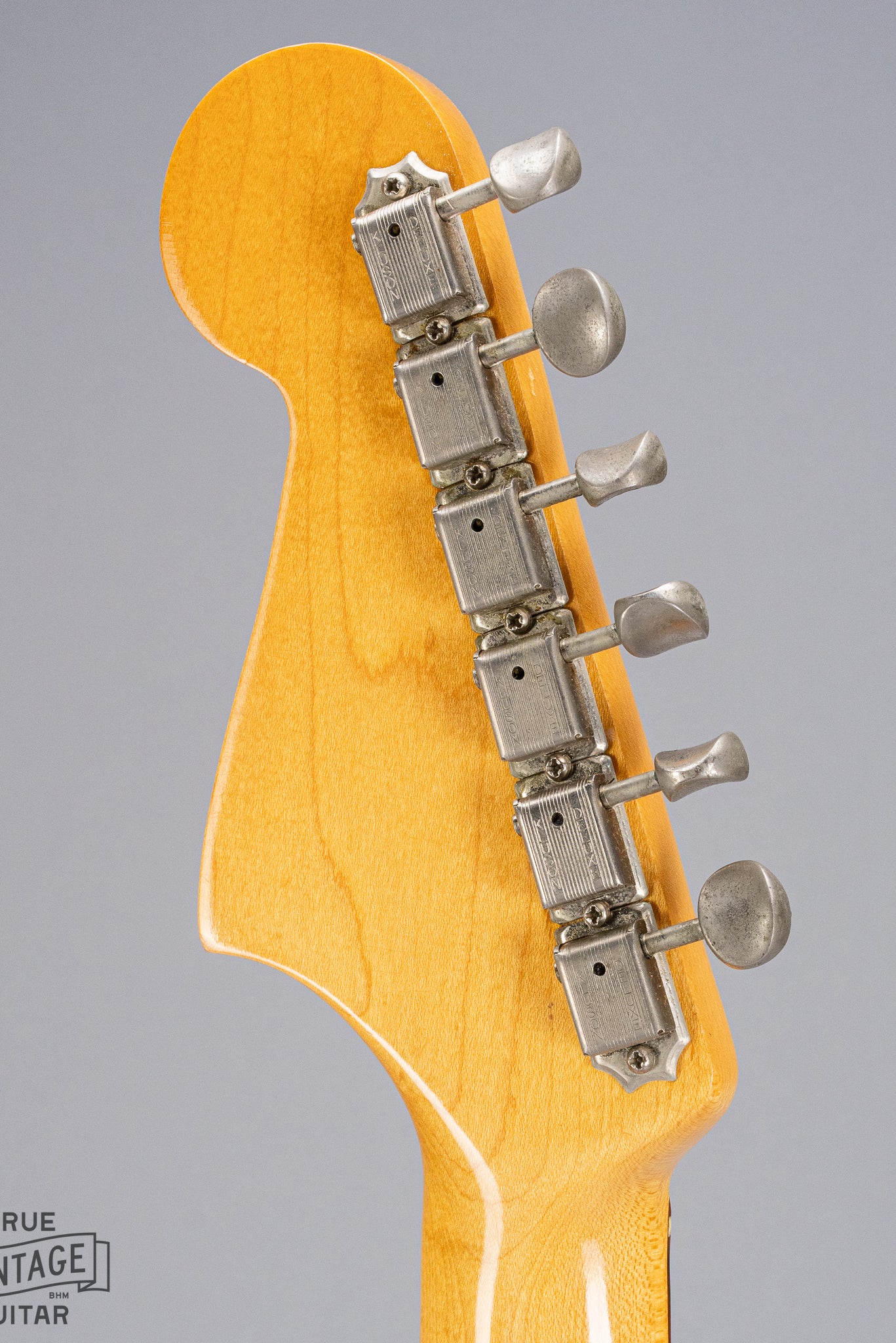 back of 1965 Fender Jazzmaster sunburst guitar headstock and tuners
