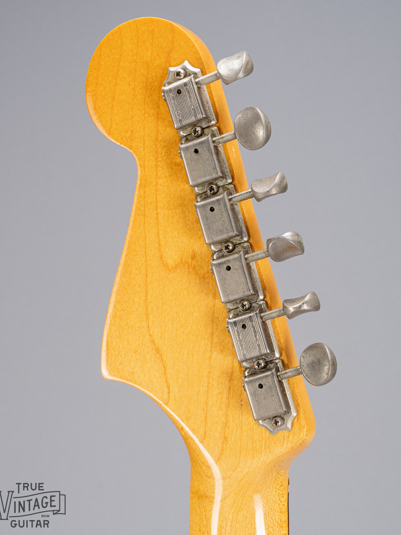back of 1965 Fender Jazzmaster sunburst guitar headstock and tuners