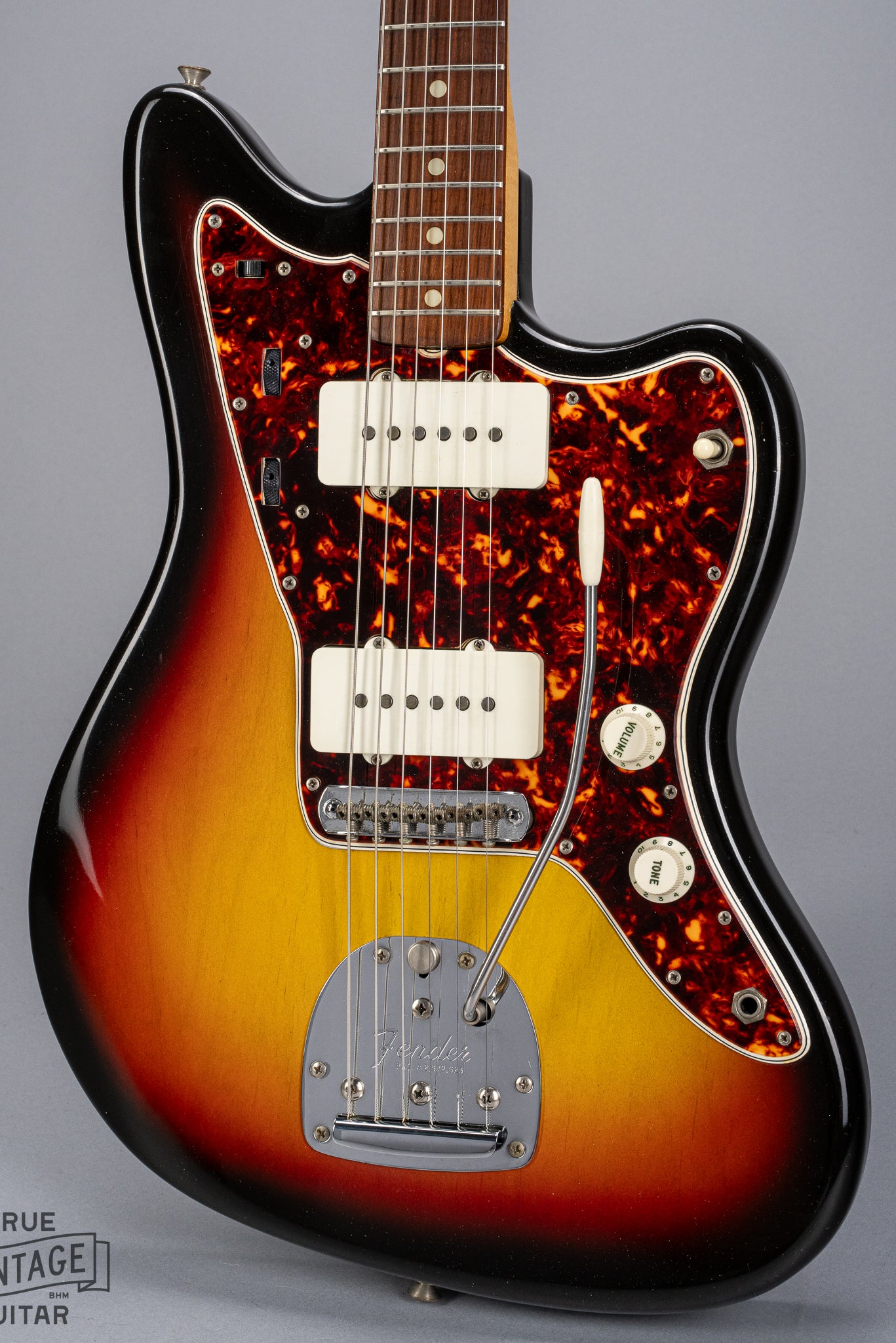 Front of 1965 Fender Jazzmaster sunburst guitar body tortoise shell pickguard pickups bridge tremolo