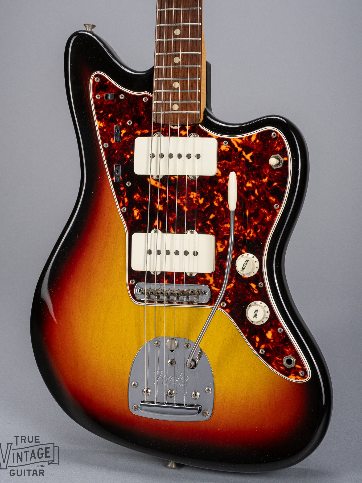 Front of 1965 Fender Jazzmaster sunburst guitar body tortoise shell pickguard pickups bridge tremolo