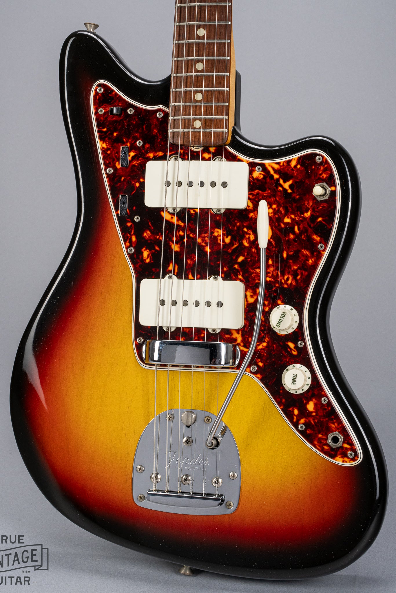 Front of 1965 Fender Jazzmaster sunburst guitar body tortoise shell pickguard pickups bridge tremolo