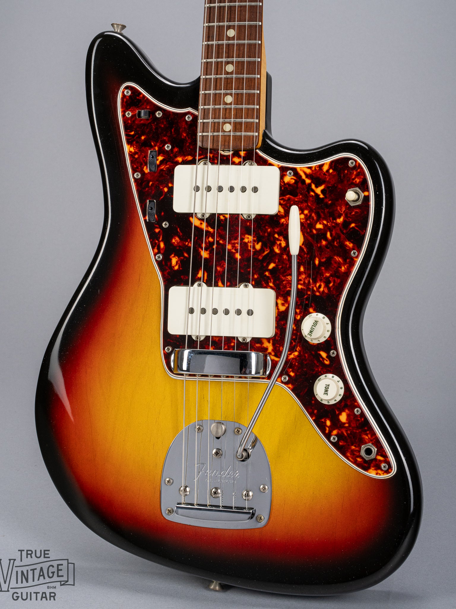 Front of 1965 Fender Jazzmaster sunburst guitar body tortoise shell pickguard pickups bridge tremolo