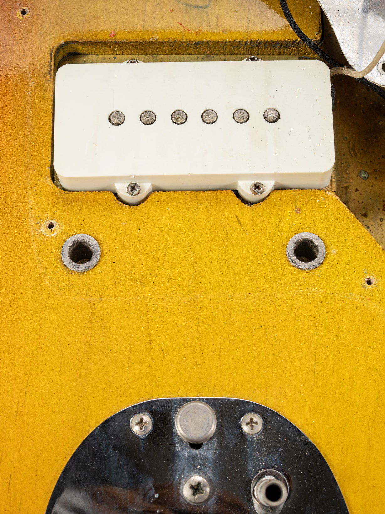 1965 Fender Jazzmaster sunburst guitar bridge holes and screw holes