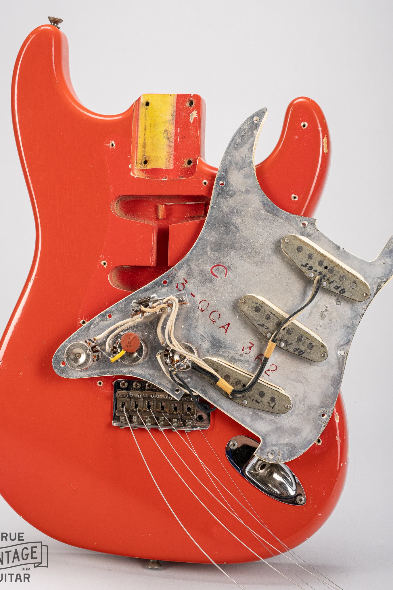 1965 Fender Stratocaster Fiesta Red custom color guitar interior original wiring, solder, and electronics