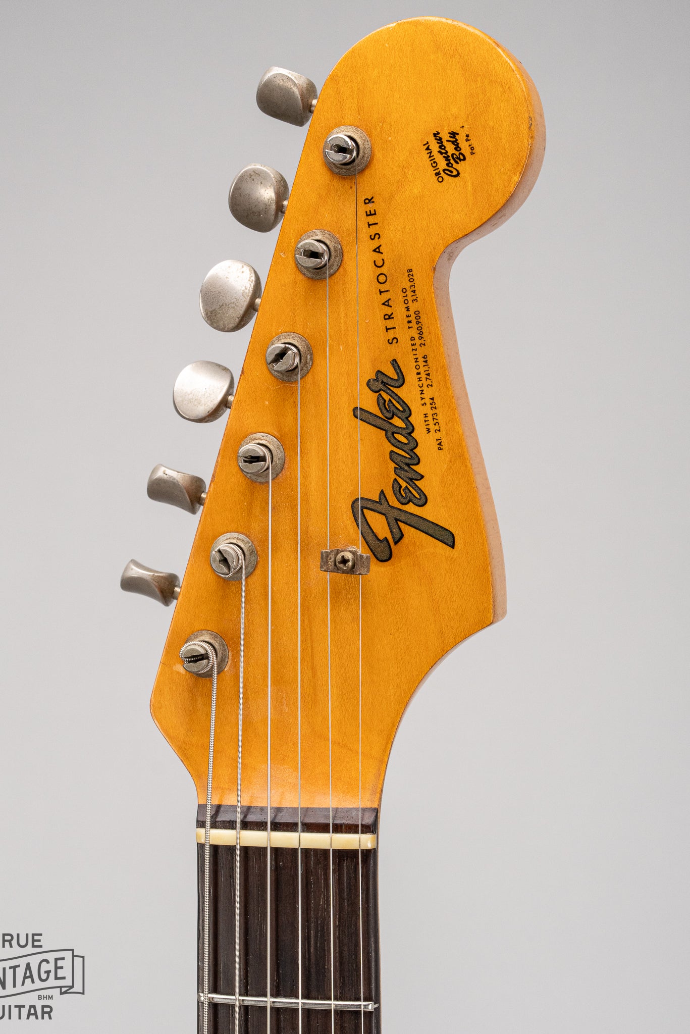 1965 Fender Stratocaster Fiesta Red custom color guitar front of headstock transition logo