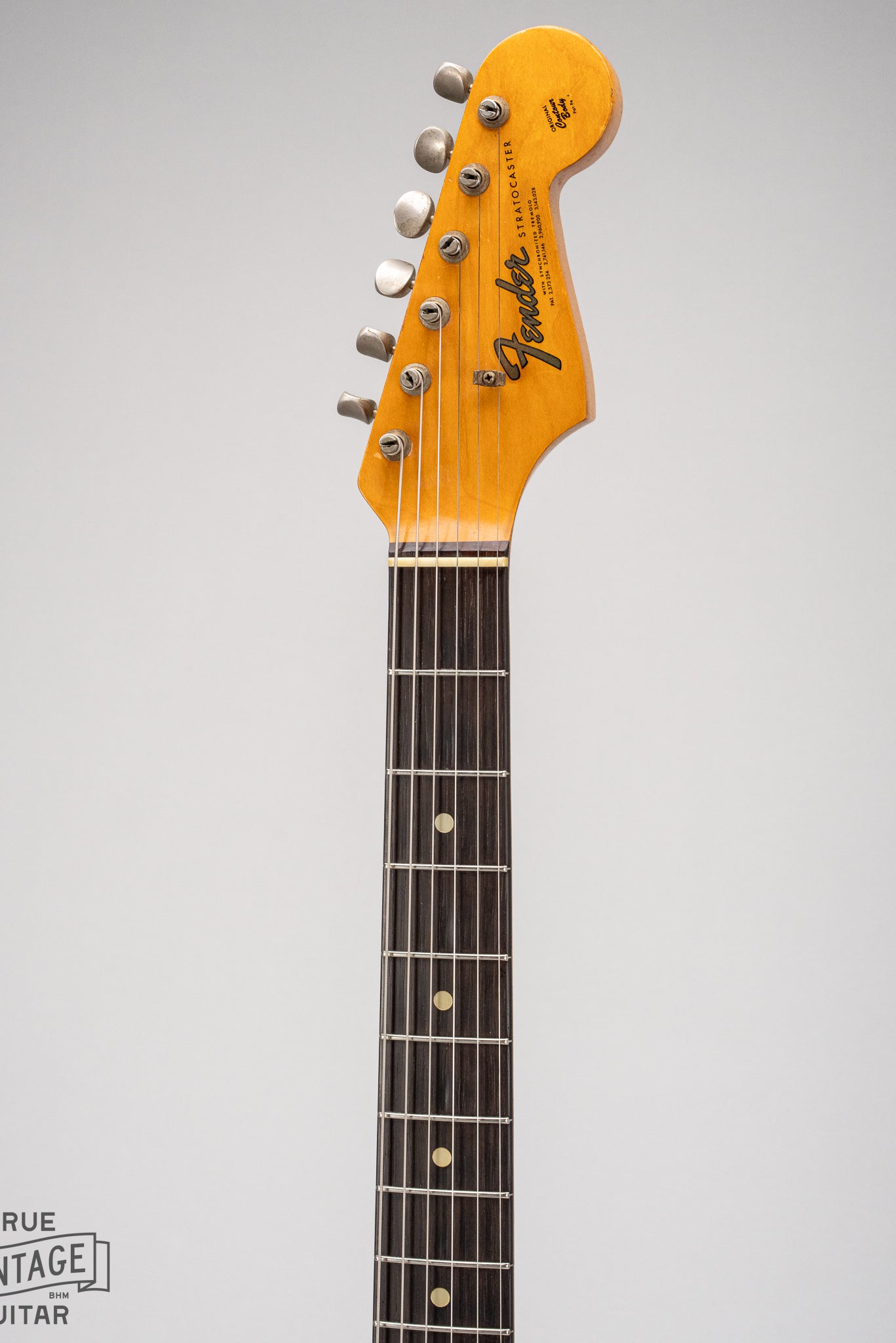 1965 Fender Stratocaster Fiesta Red custom color guitar front of neck and headstock, Brazilian Rosewood fretboard
