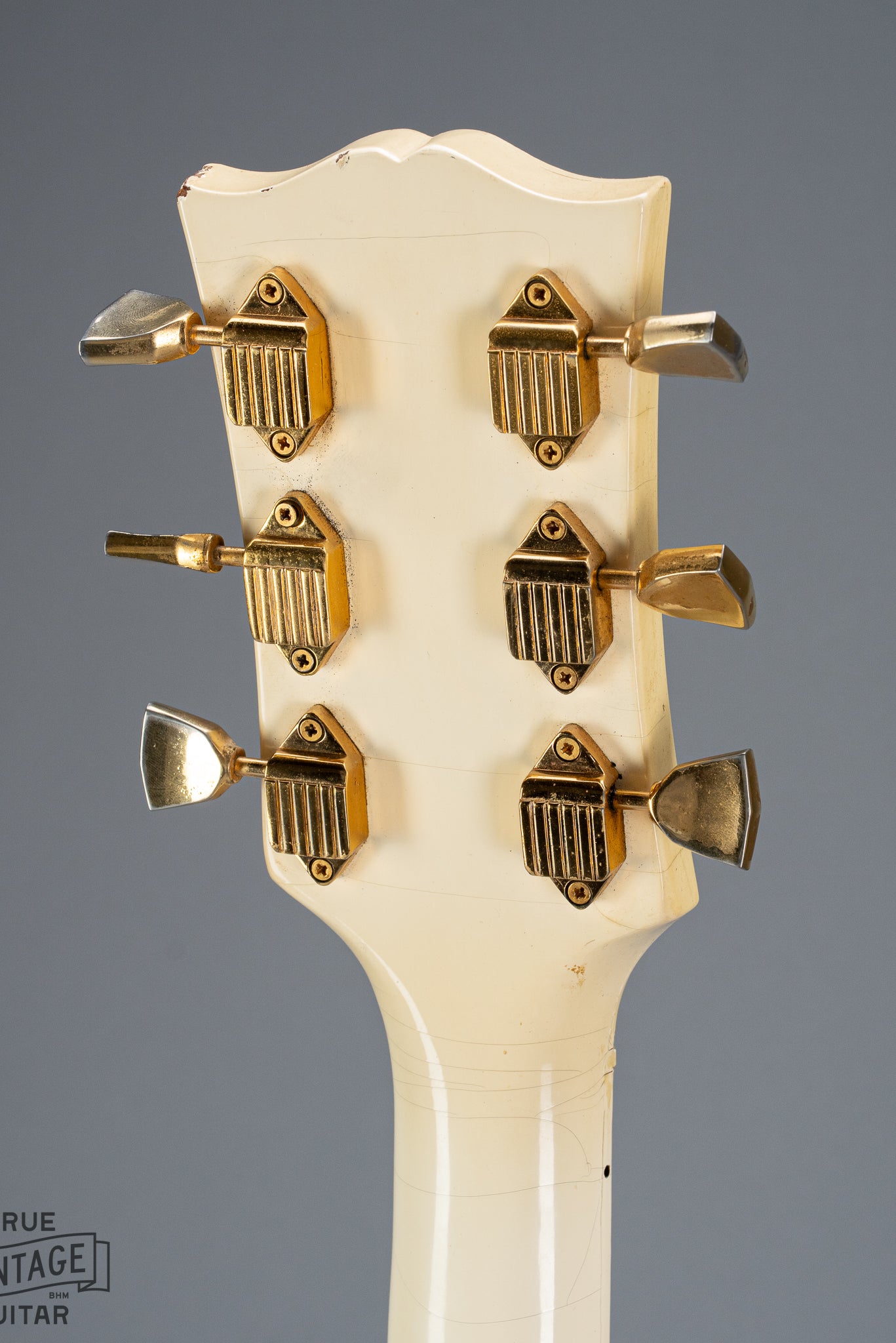 back of 1965 Gibson SG Custom white guitar three pickup with Bigsby B5 vibrato tailpiece headstock