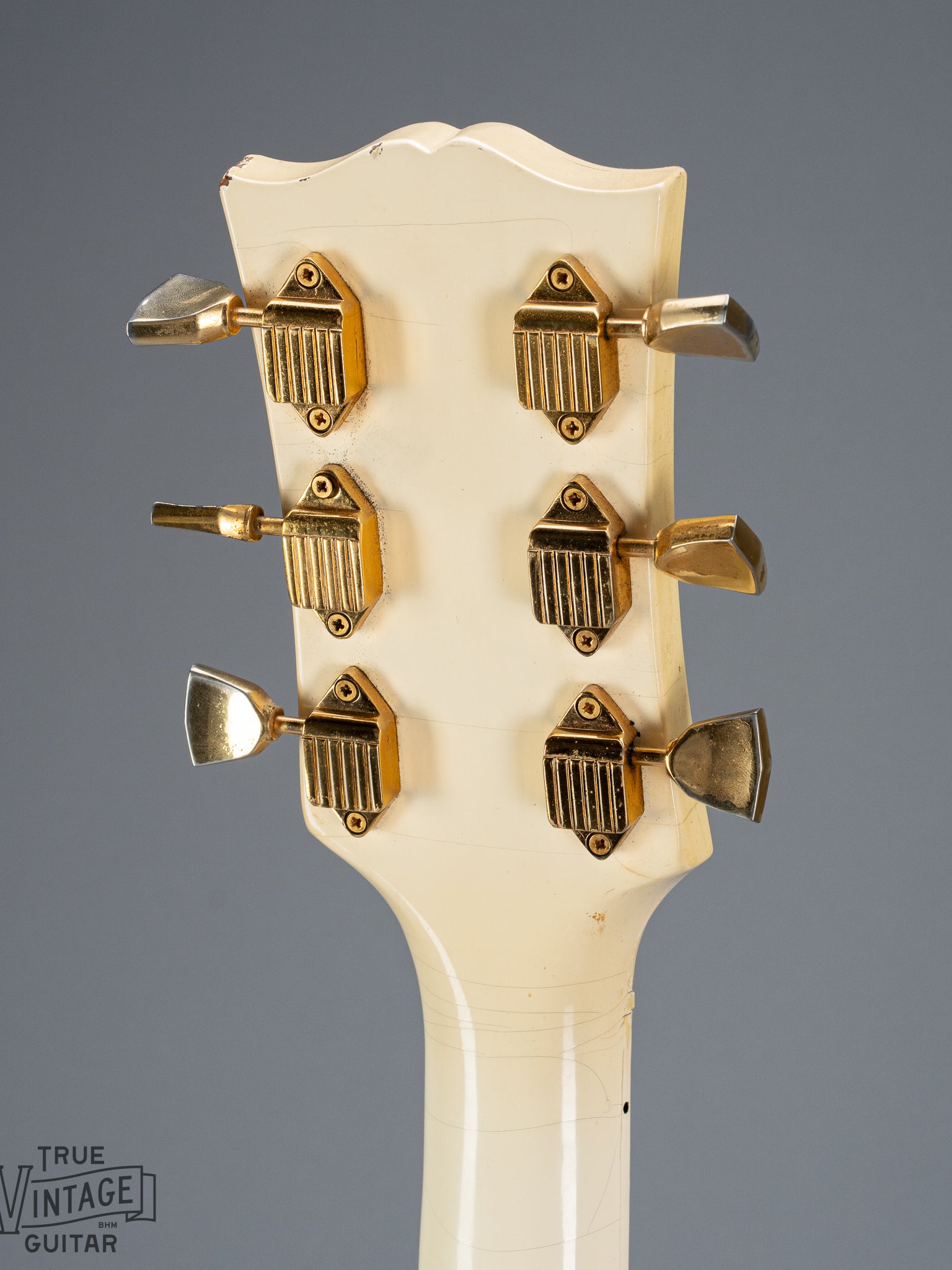 back of 1965 Gibson SG Custom white guitar three pickup with Bigsby B5 vibrato tailpiece headstock