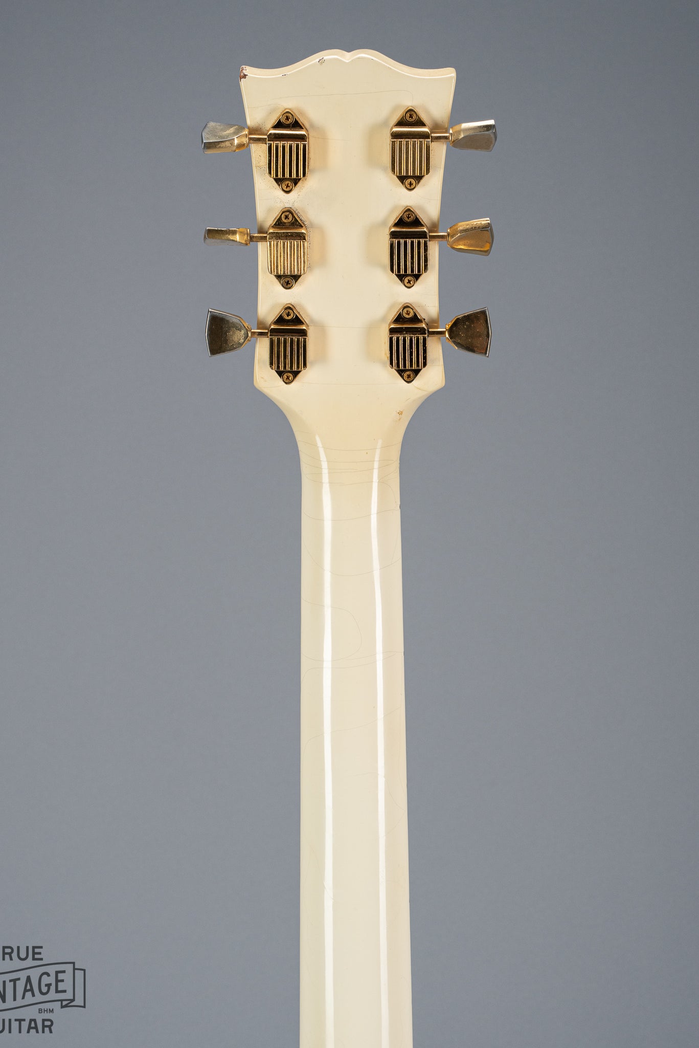 back of 1965 Gibson SG Custom white guitar three pickup with Bigsby B5 vibrato tailpiece neck and headstock