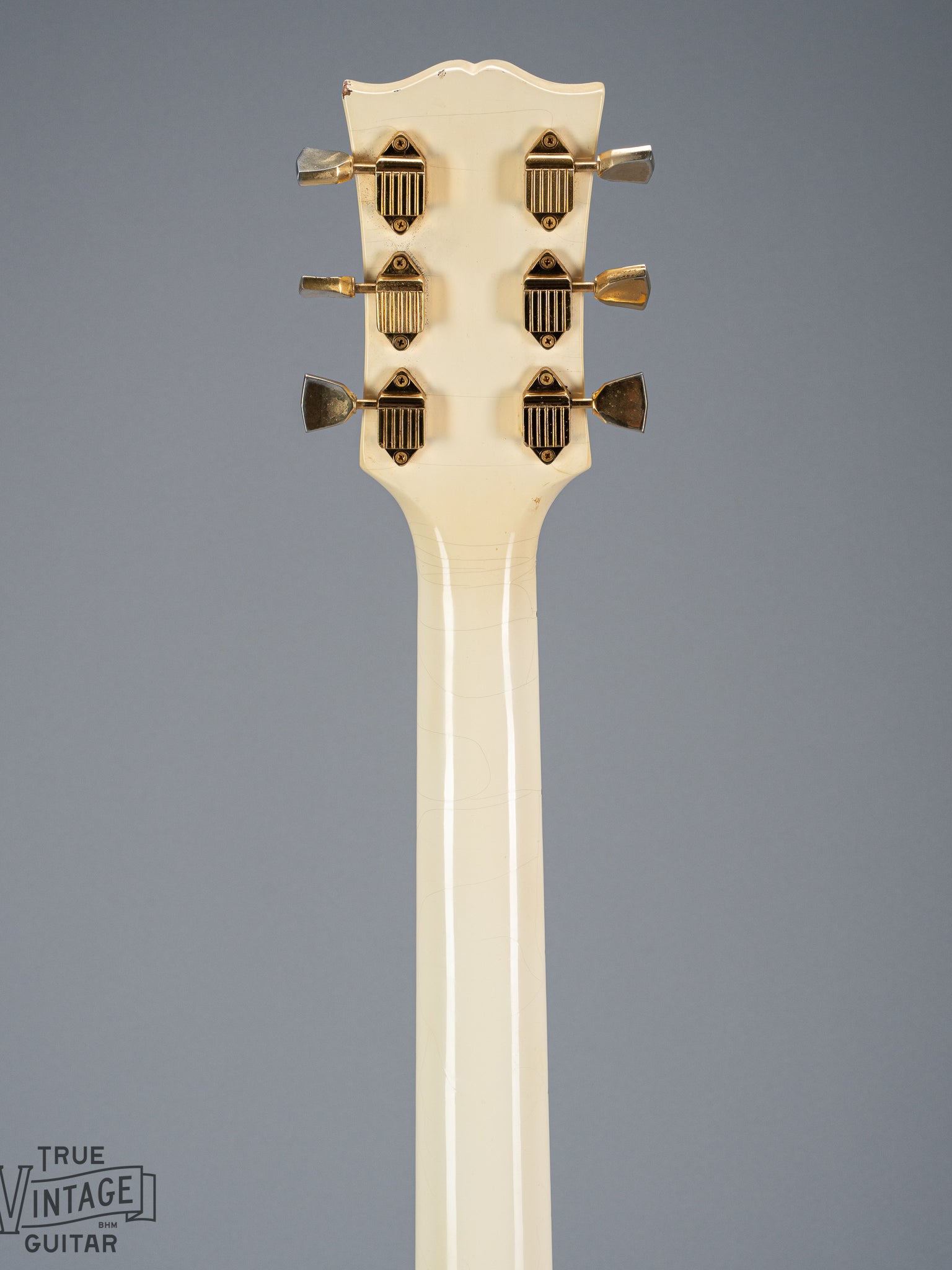 back of 1965 Gibson SG Custom white guitar three pickup with Bigsby B5 vibrato tailpiece neck and headstock