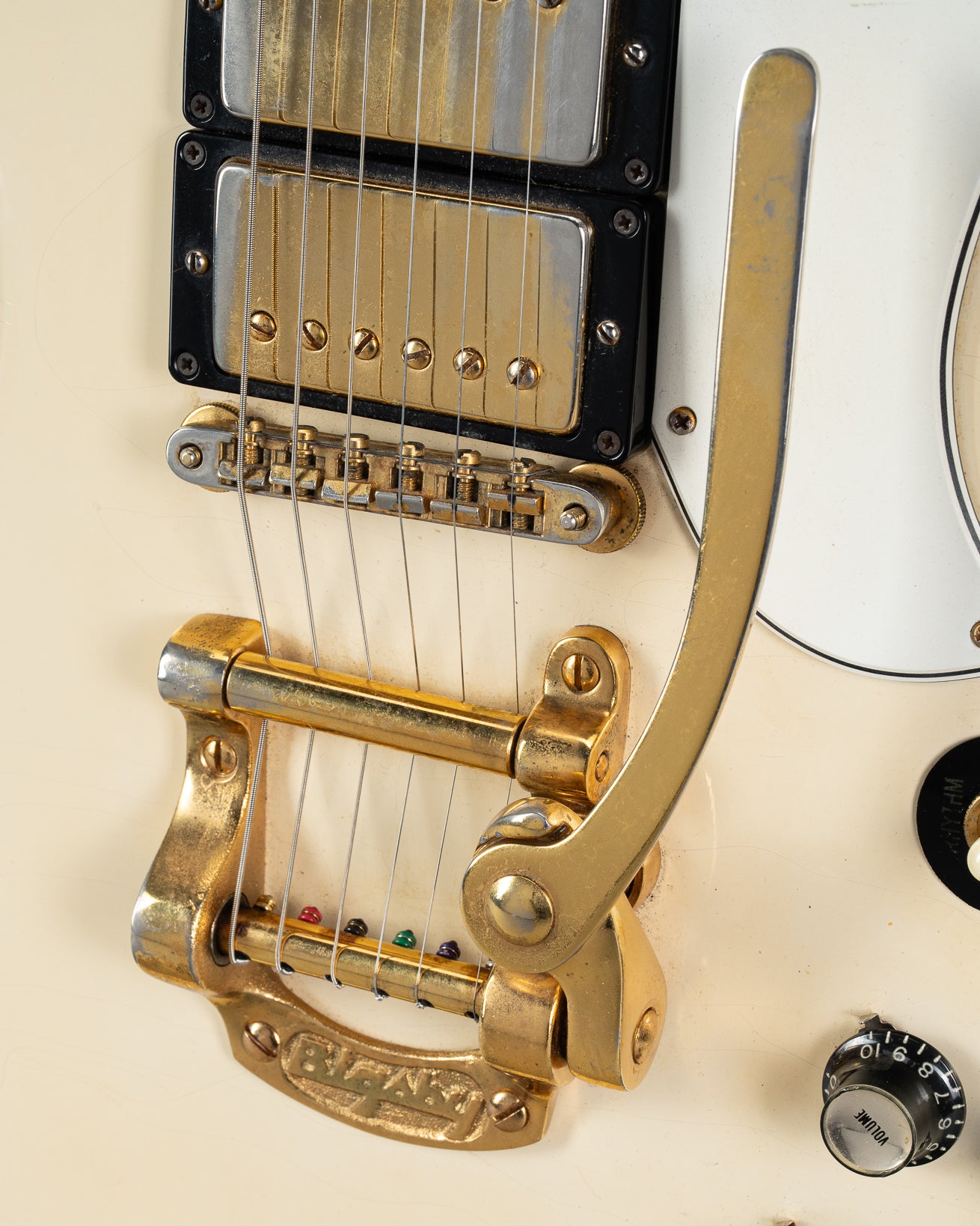Front of 1965 Gibson SG Custom white guitar three pickup with Bigsby B5 vibrato tailpiece