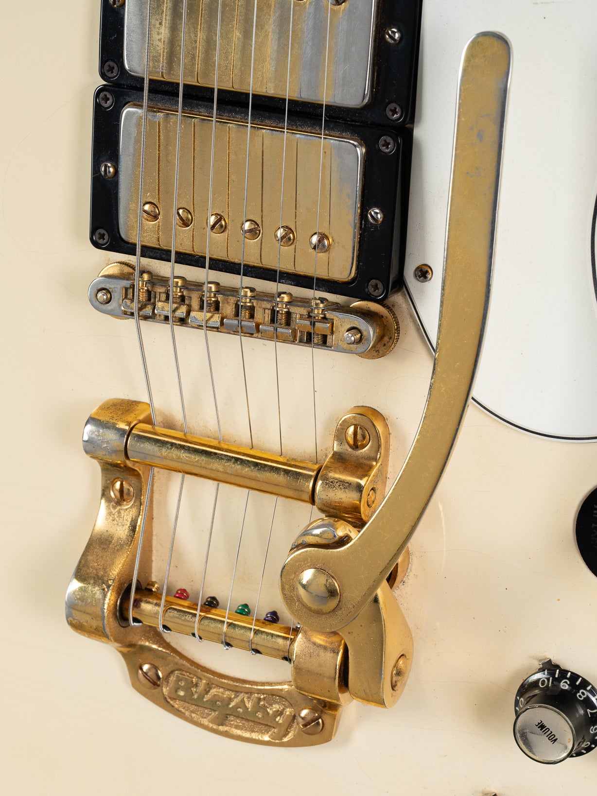 Front of 1965 Gibson SG Custom white guitar three pickup with Bigsby B5 vibrato tailpiece
