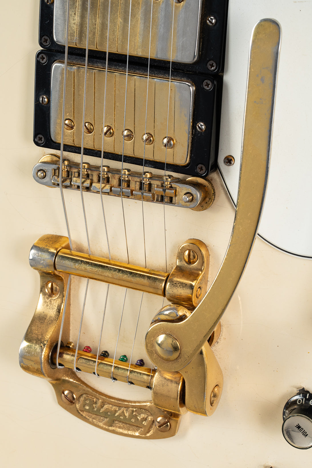 Front of 1965 Gibson SG Custom white guitar three pickup with Bigsby B5 vibrato tailpiece
