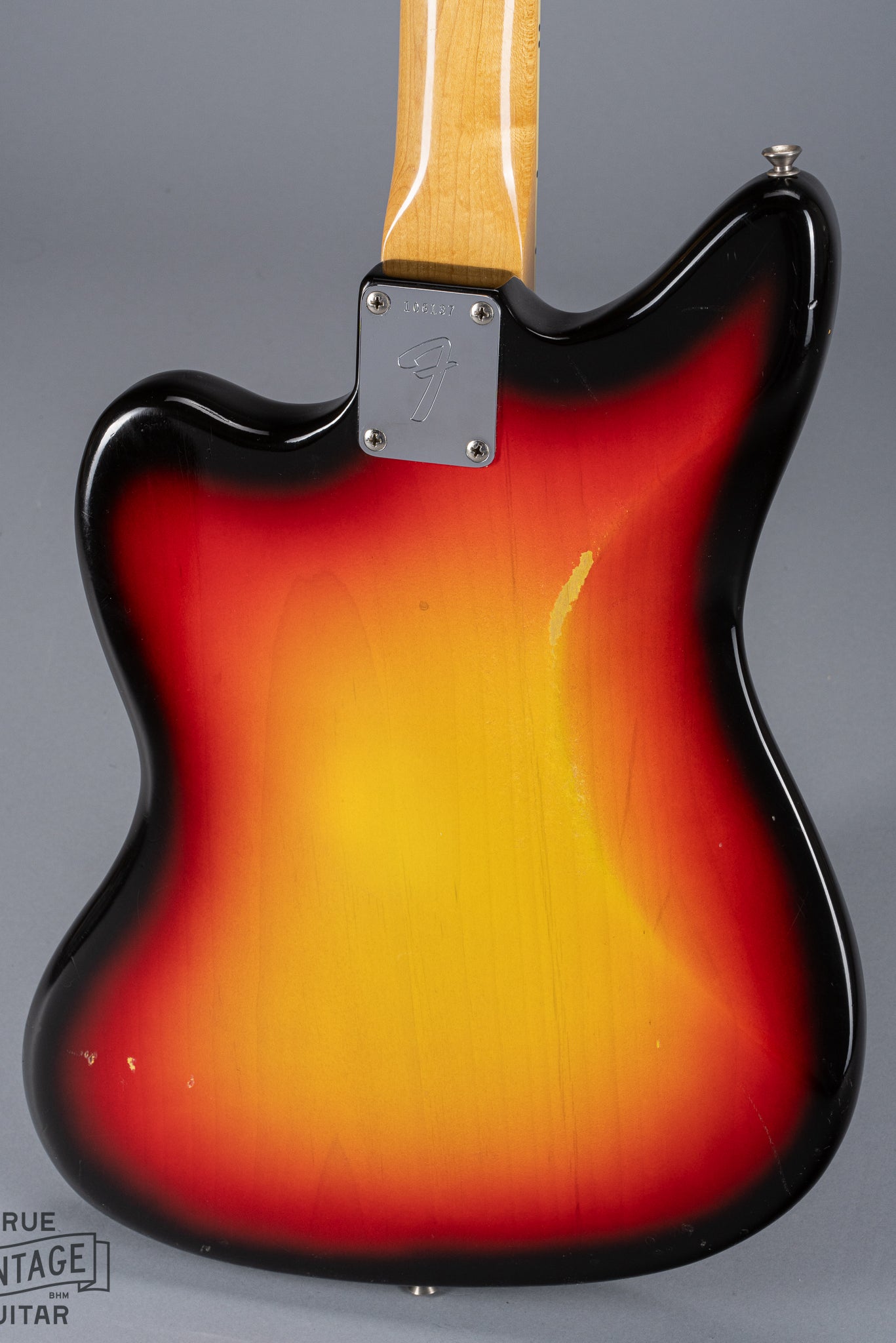 Back of 1965 Fender Jaguar Sunburst Neck Plate Serial Number F Logo Neck Plate Fretboard Binding Tortoise Shell Pick Guard Offset