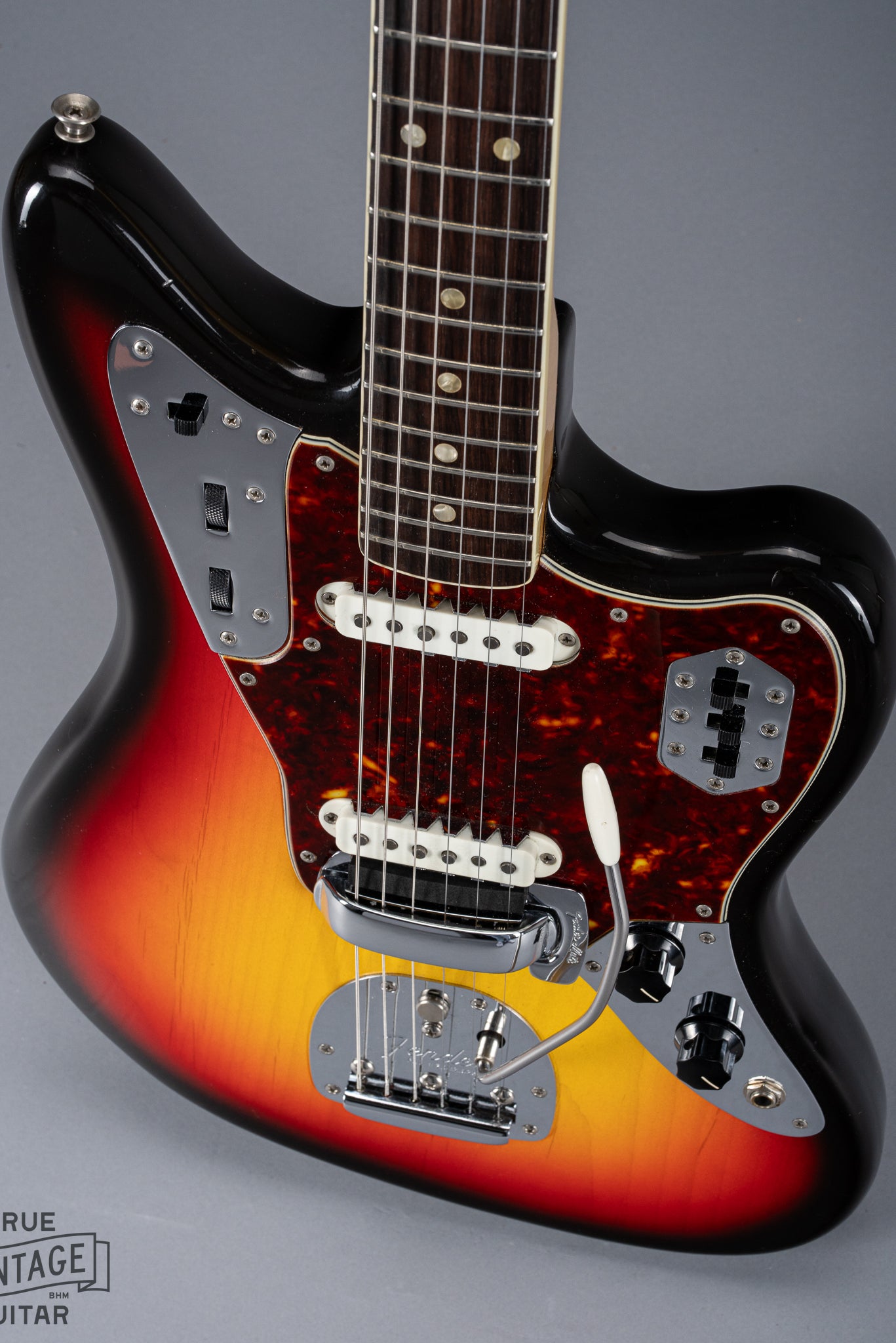 Front of 1965 Fender Jaguar Sunburst Pickups Fretboard Binding Tortoise Shell Pick Guard Tremelo System Bridge Cover Pearloid Inlays