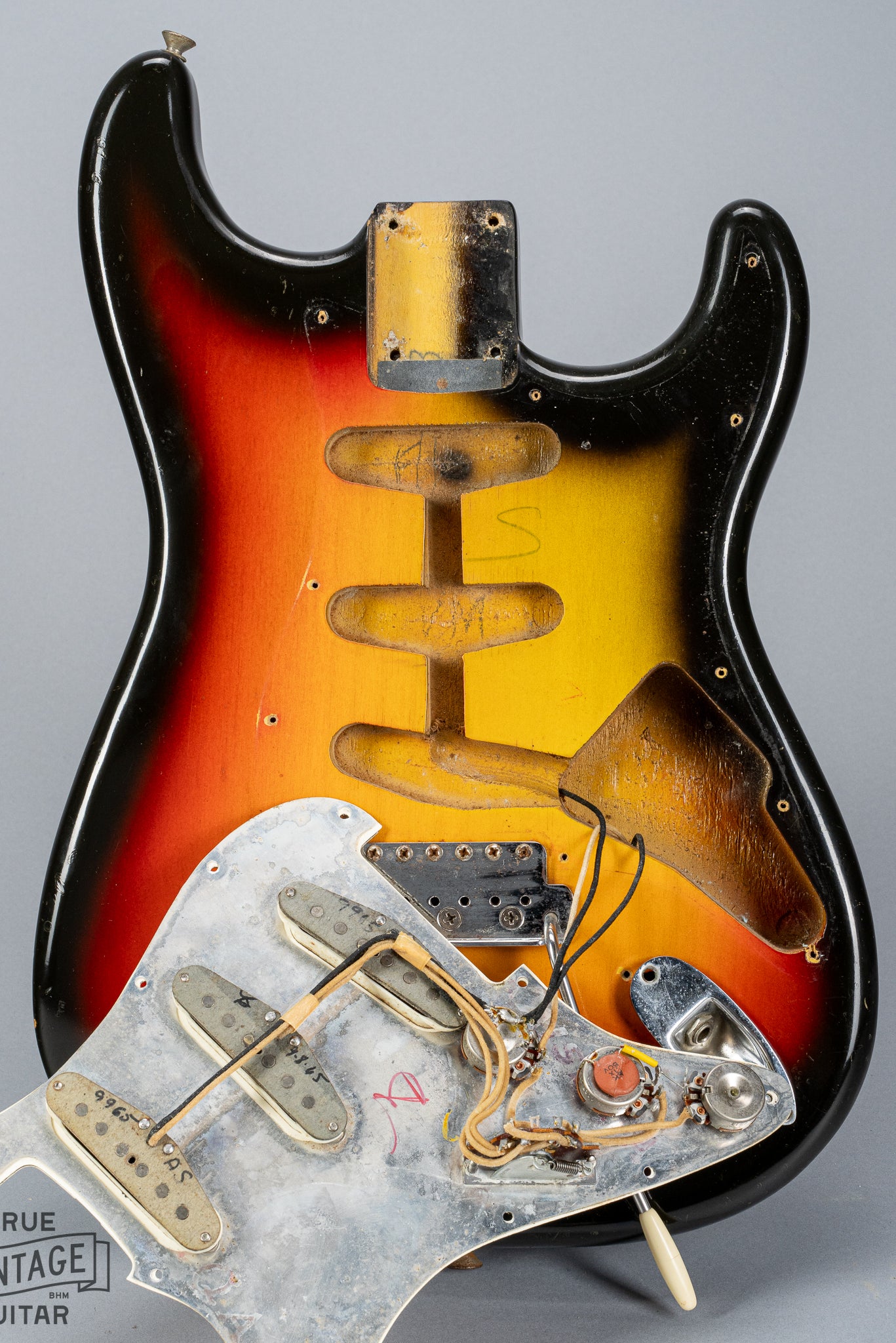 1965 Fender Stratocaster Sunburst under the pickguard pickups wiring electronics pots pickup route and cavity