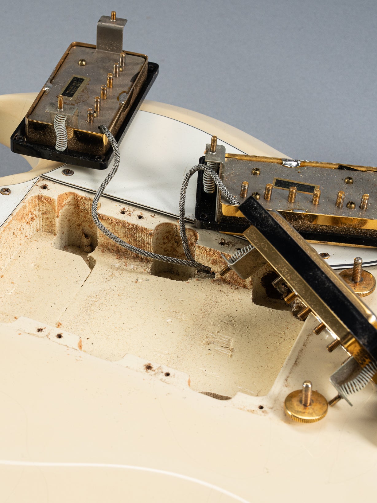 1965 Gibson SG Custom white guitar three humbucker pickups cavity and screw holes