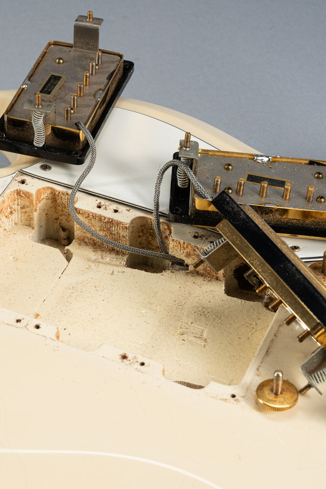 1965 Gibson SG Custom white guitar three humbucker pickups cavity and screw holes