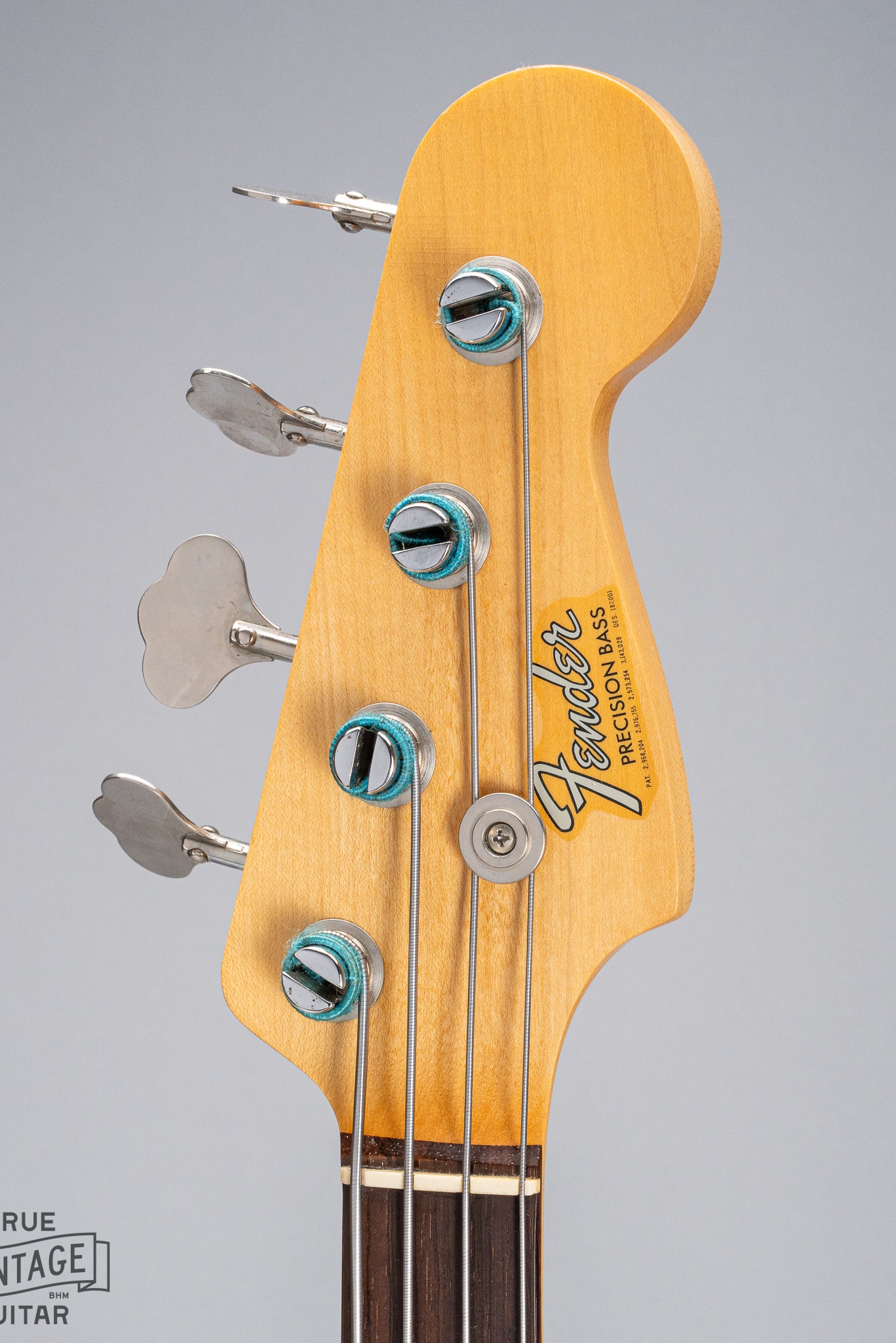 front of 1966 Fender Precision Bass Blond bass guitar headstock Fender logo Tuners original strings