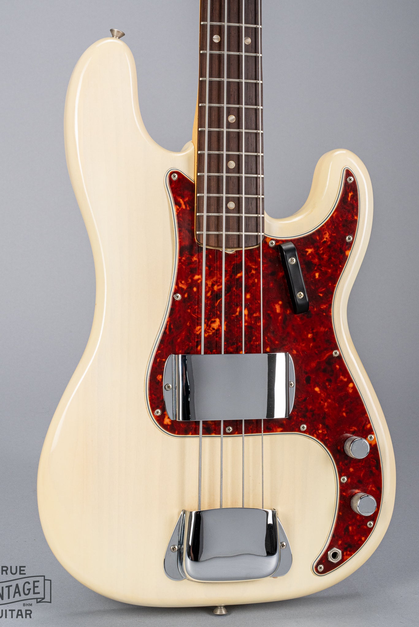 Front of 1966 Fender Precision Bass Blond bass guitar body Tortoise Shell