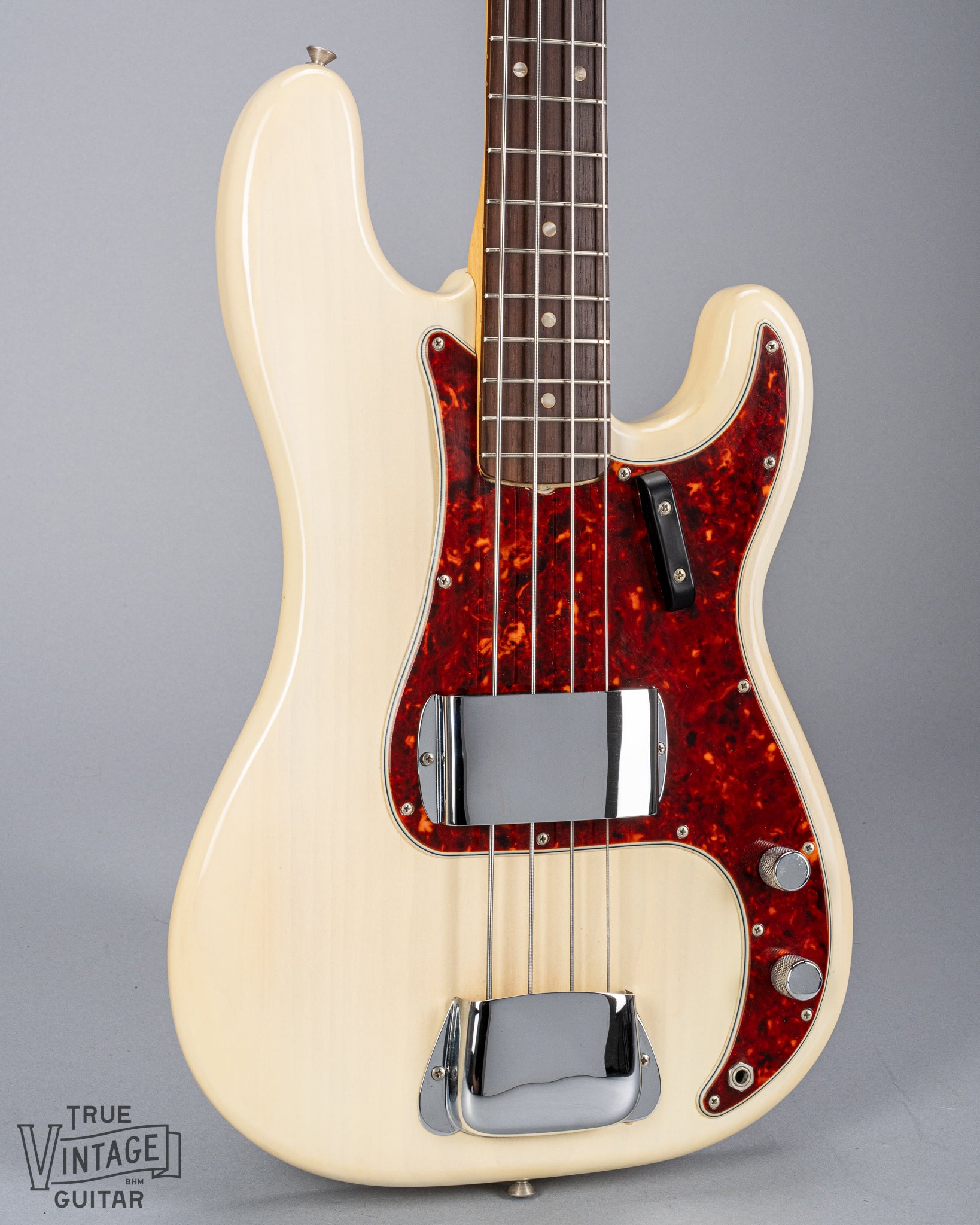 front of 1966 Fender Precision Bass Blond bass guitar body Tortoise Shell