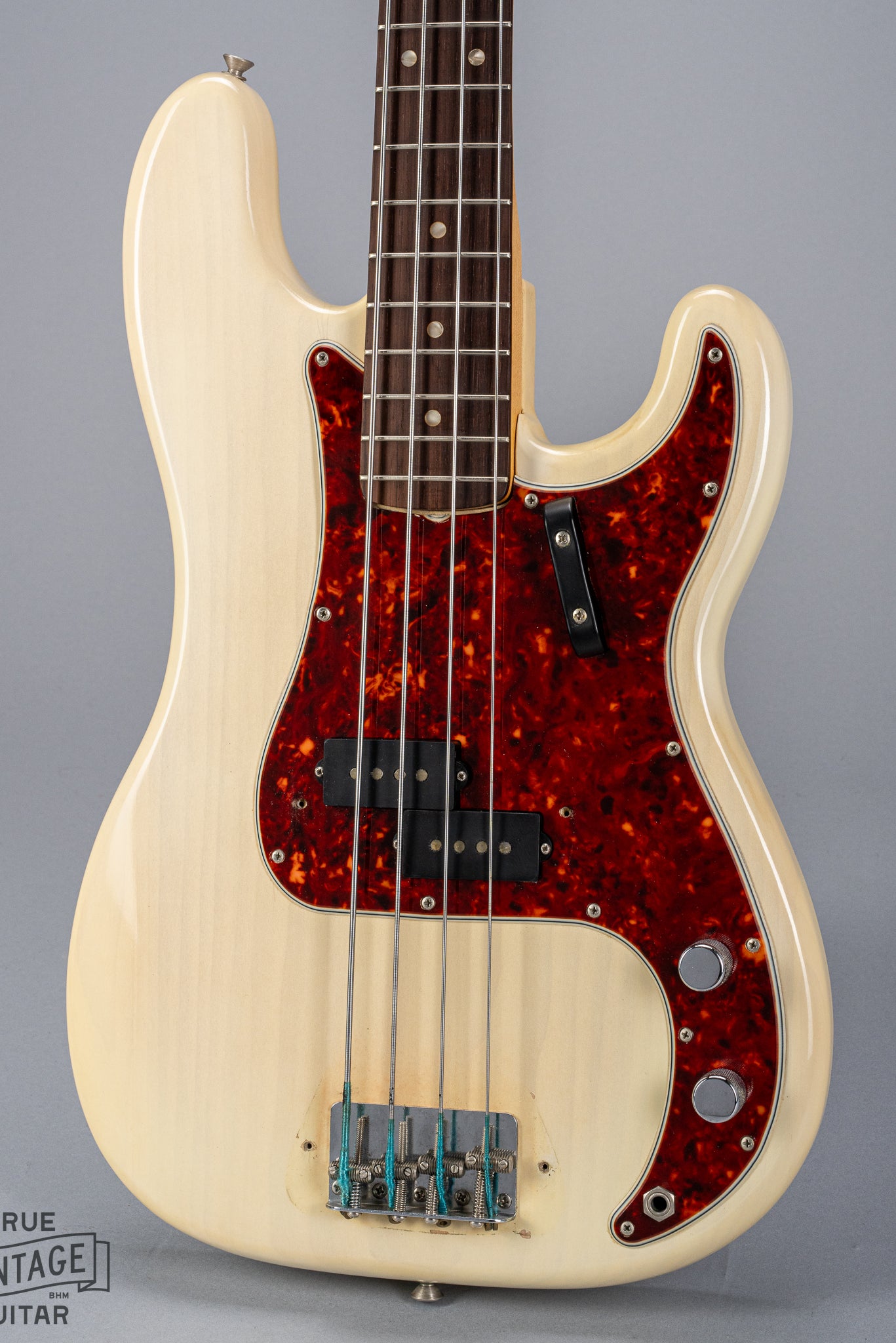 front of 1966 Fender Precision Bass Blond pickups and bridge