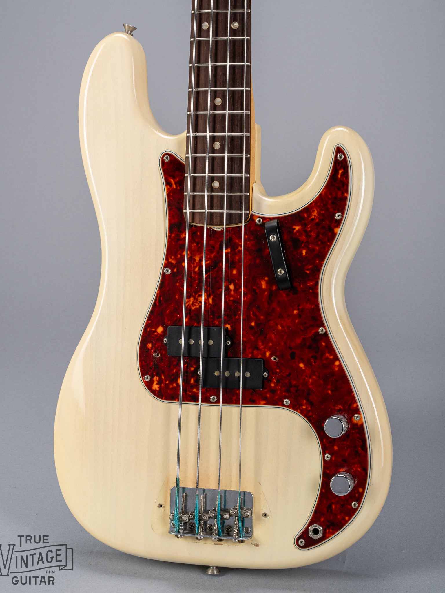 front of 1966 Fender Precision Bass Blond pickups and bridge