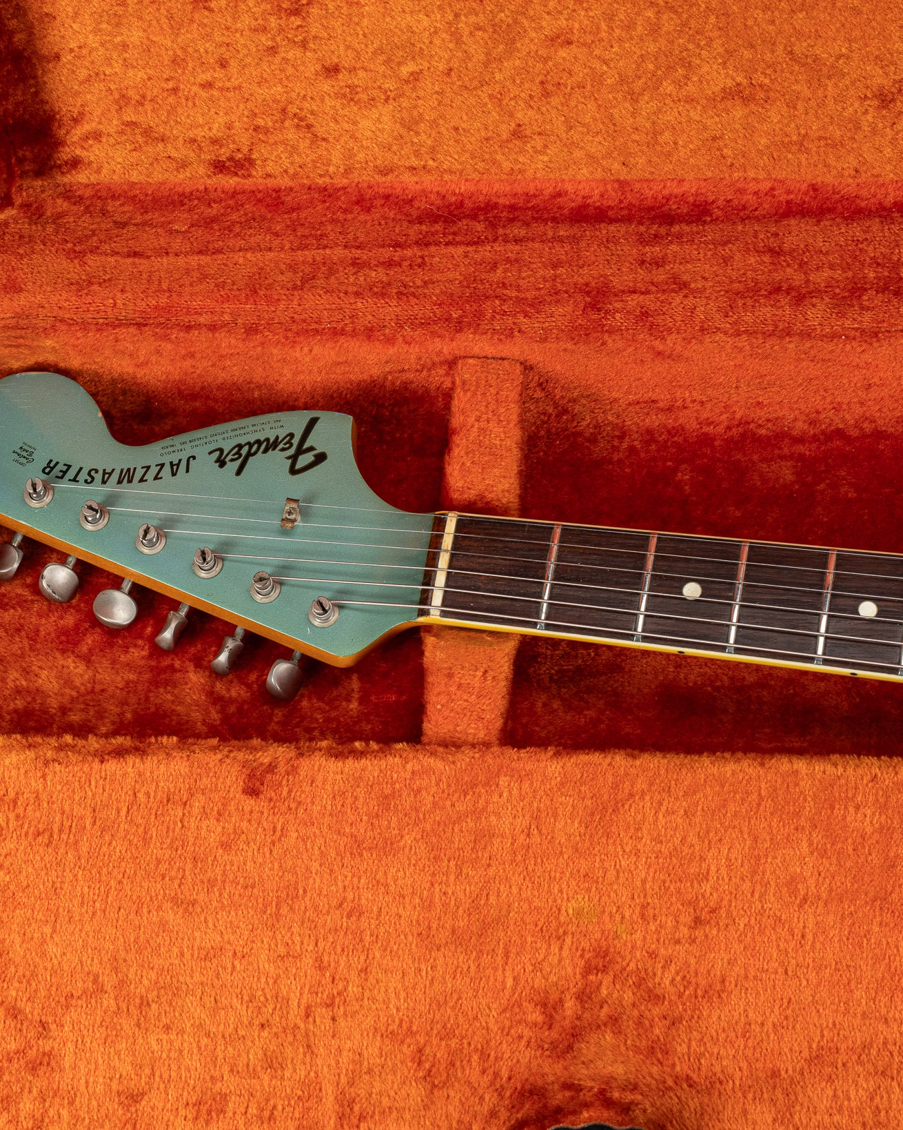 Front of 1966 Fender Jazzmaster Blue Ice Metallic Custom Color Guitar matching headstock in original case